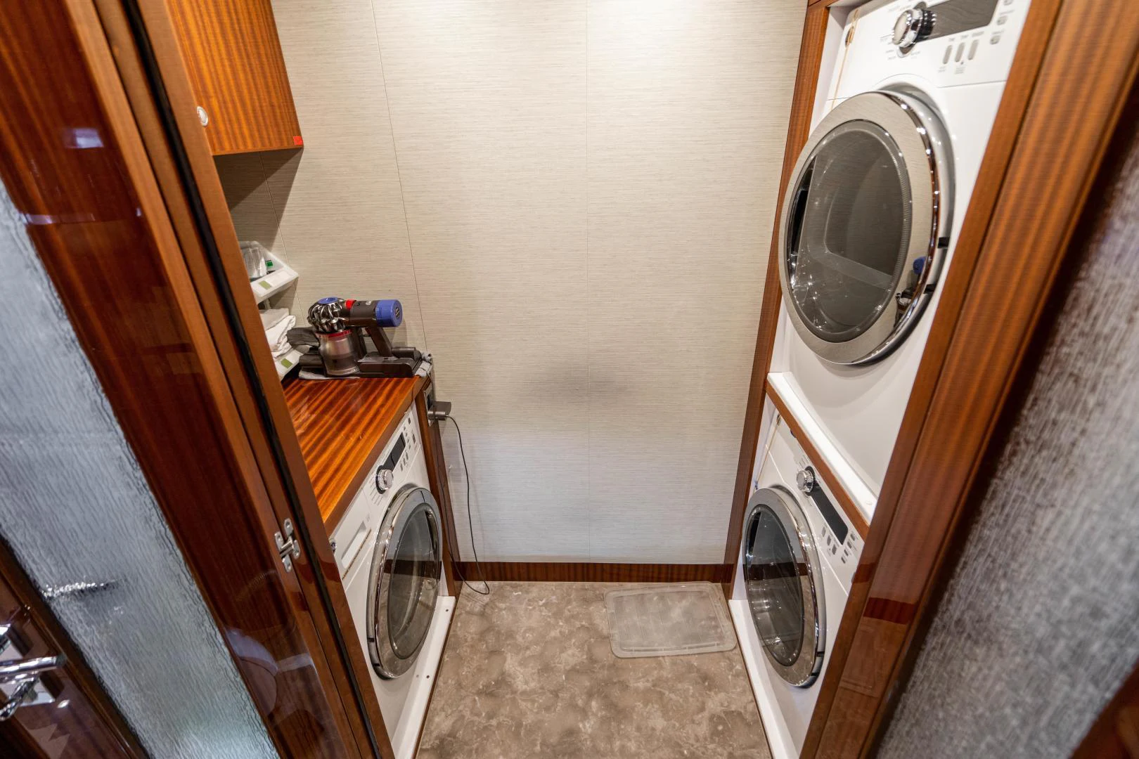 a washer and dryer in a room aboard RENAISSANCE Yacht for Sale