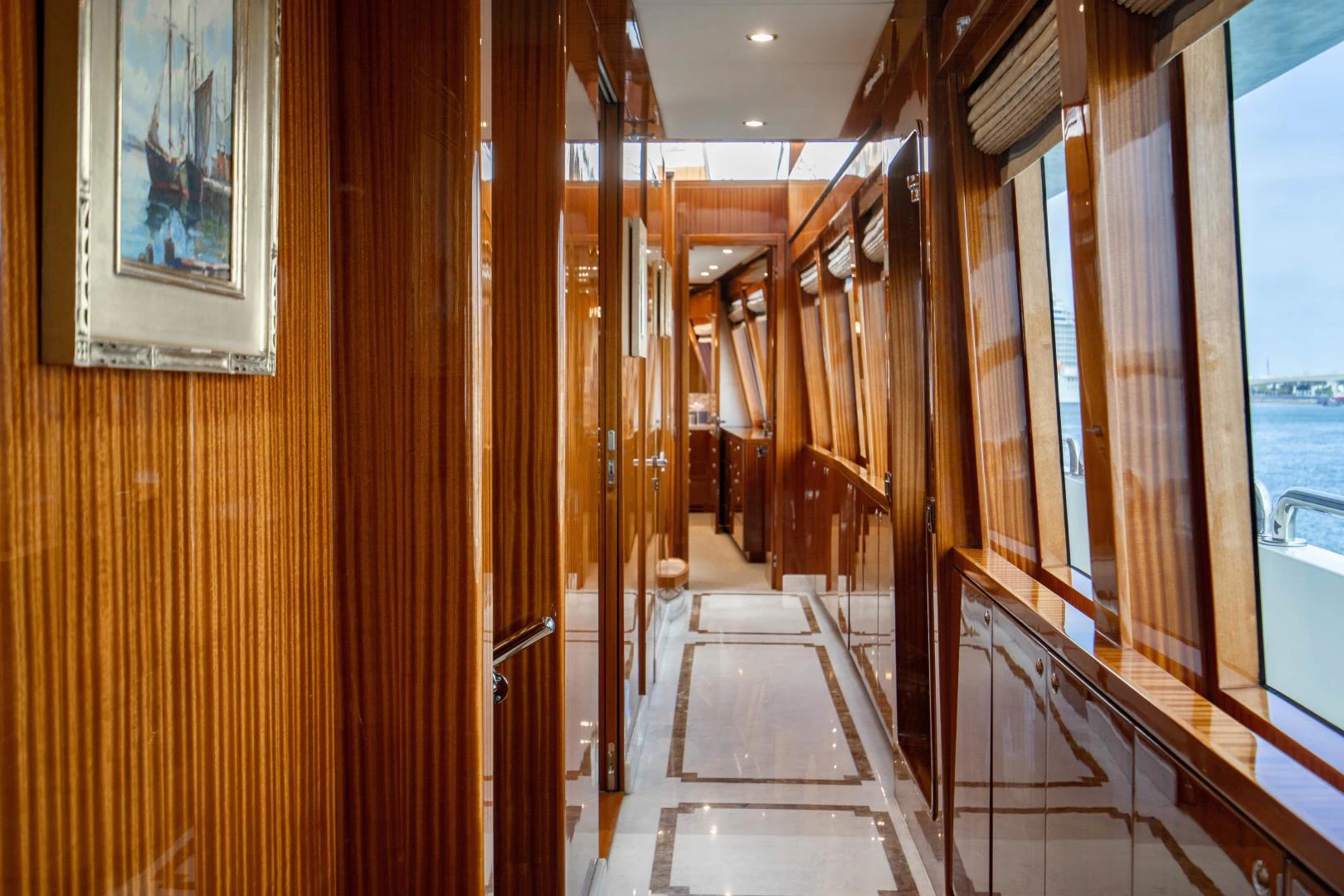 a hallway with wood doors aboard RENAISSANCE Yacht for Sale