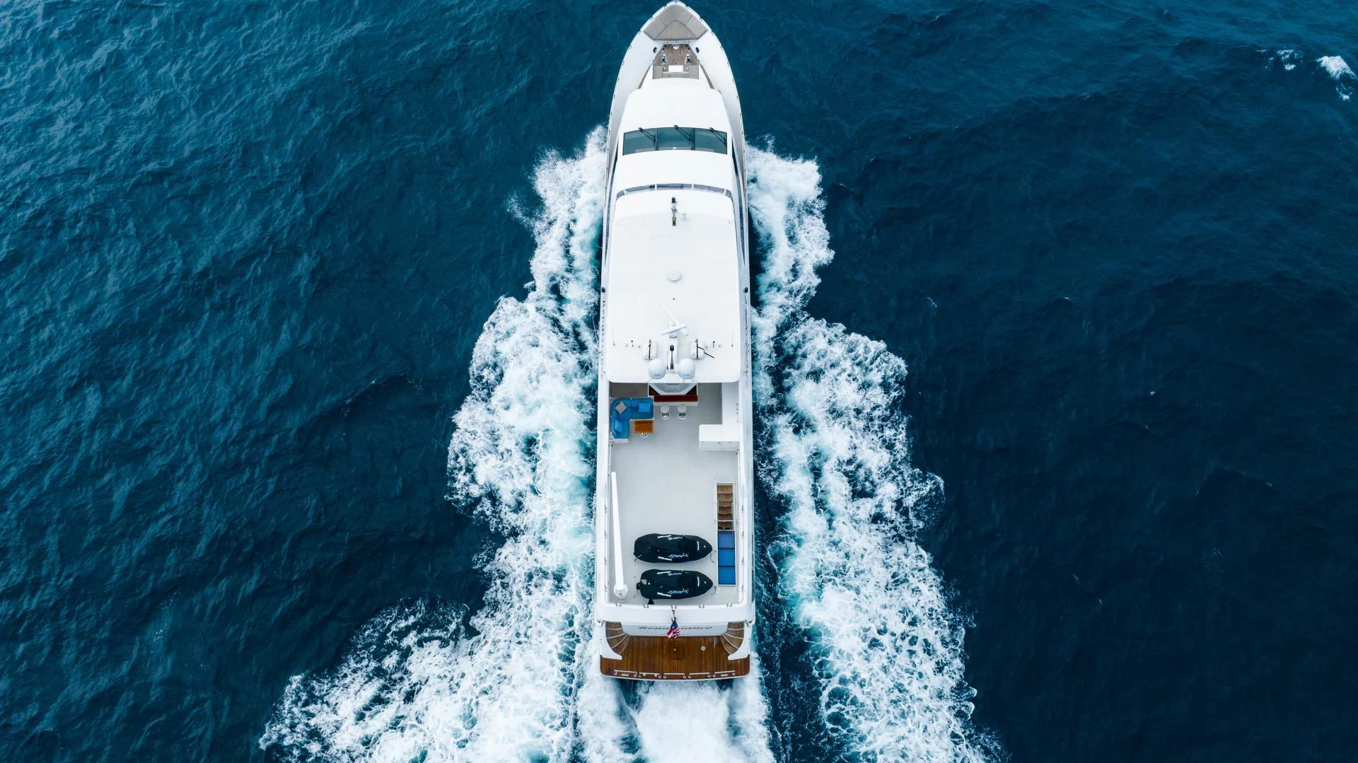 a white boat in the water aboard RENAISSANCE Yacht for Sale