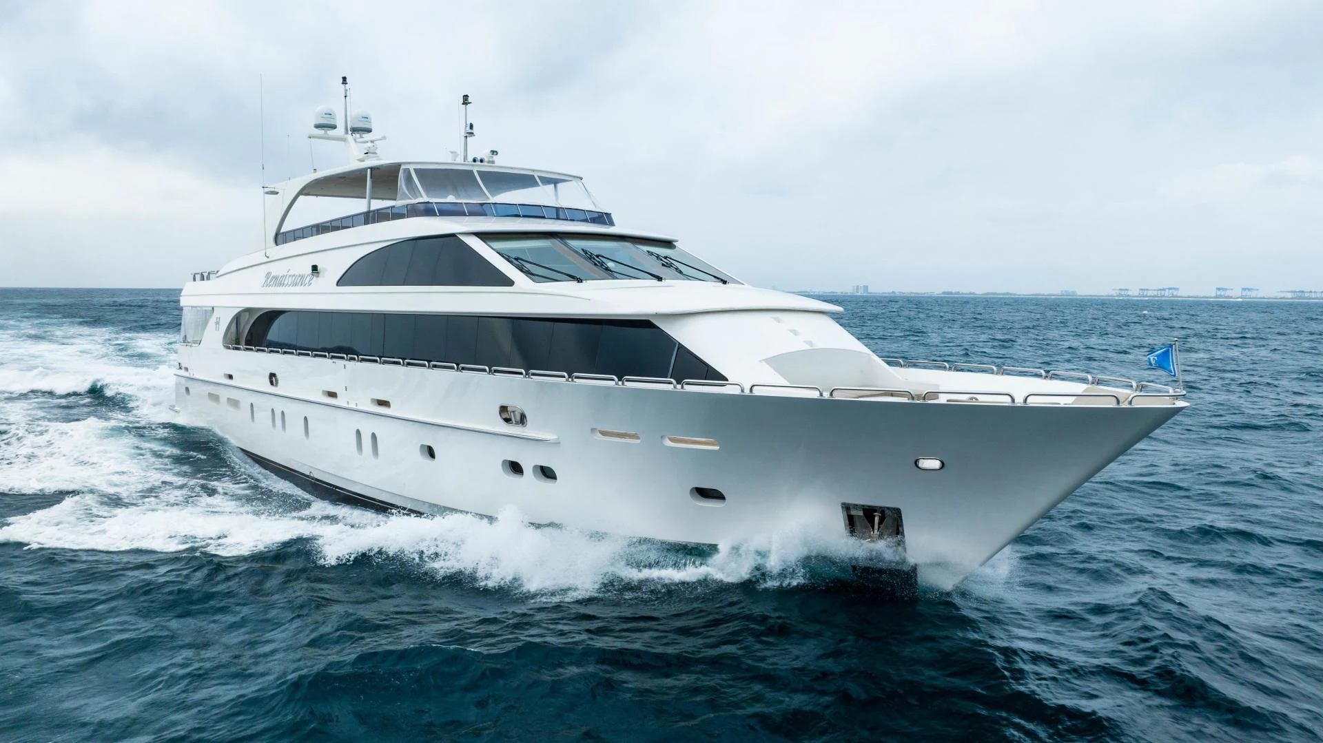 a white yacht on the water aboard RENAISSANCE Yacht for Sale