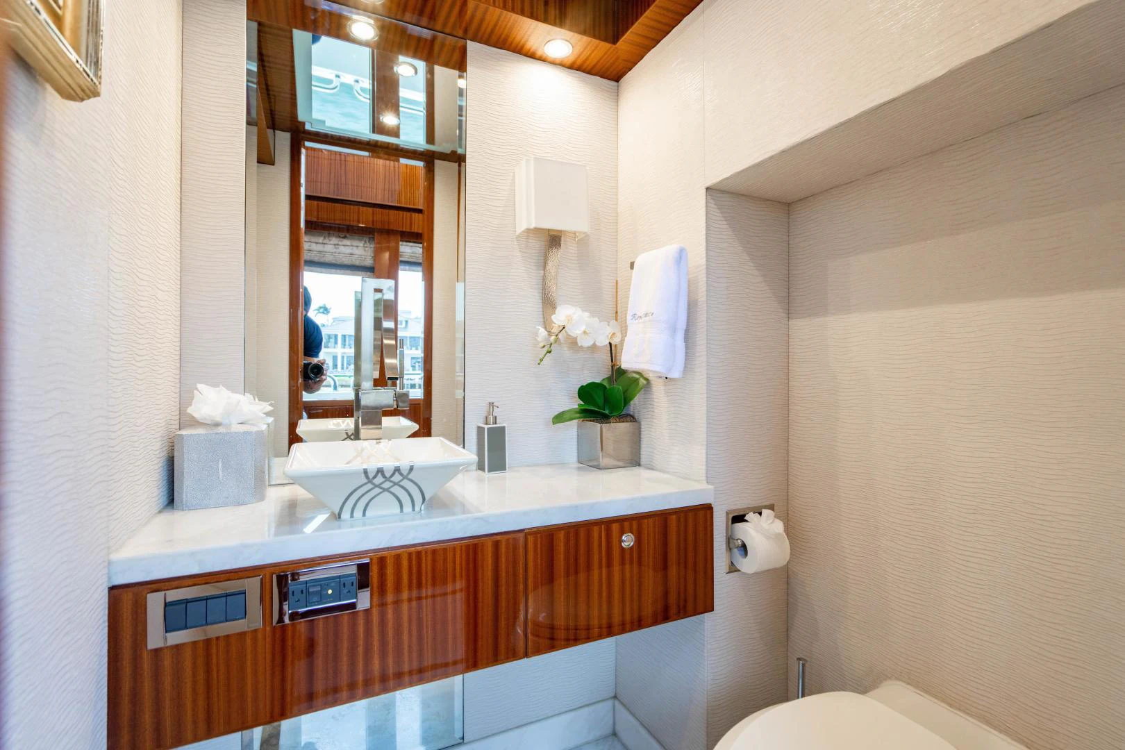 a bathroom with a large mirror aboard RENAISSANCE Yacht for Sale