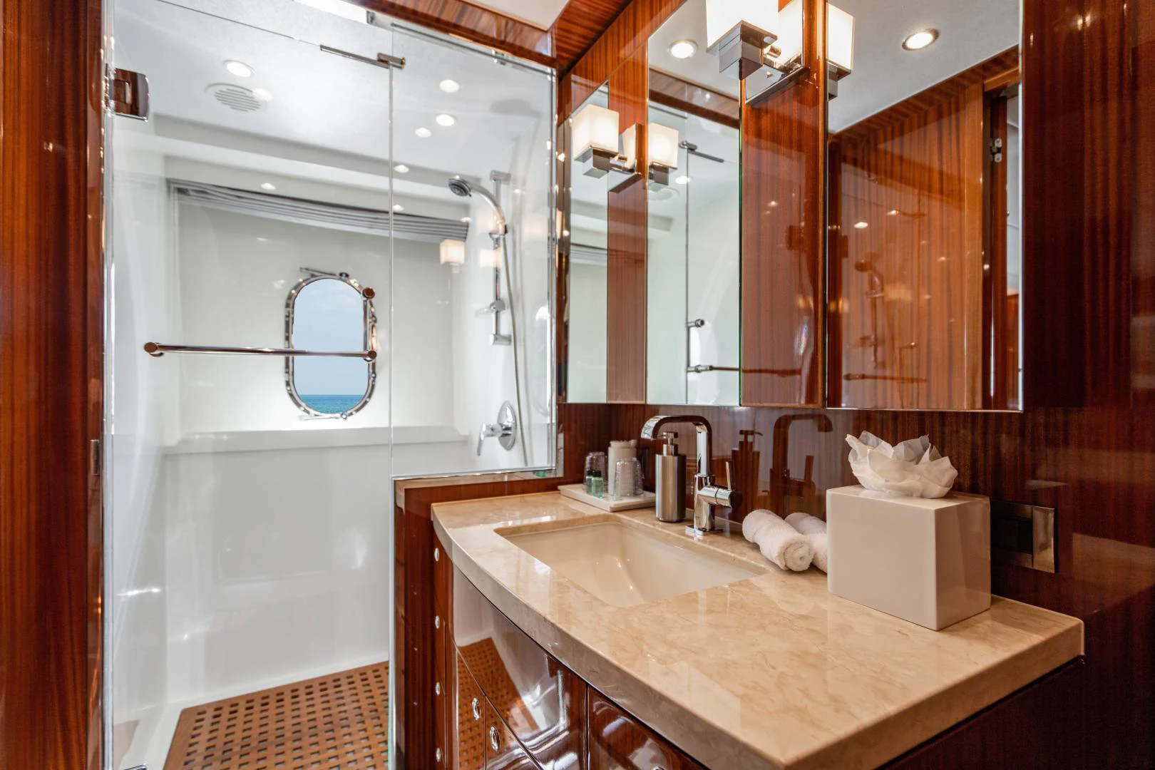 a bathroom with a large mirror aboard RENAISSANCE Yacht for Sale
