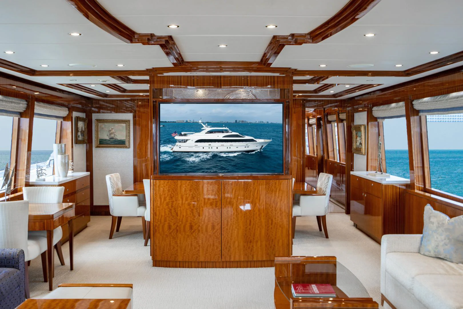 a room with a large window and a large fish tank aboard RENAISSANCE Yacht for Sale