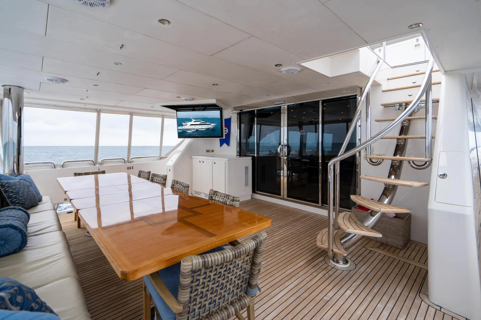a room with a table and chairs aboard RENAISSANCE Yacht for Sale