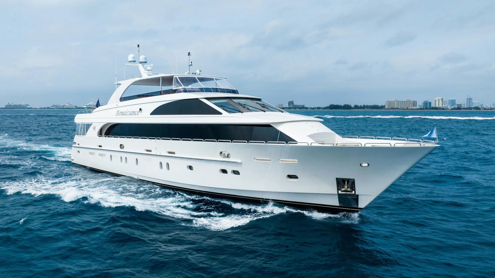 a white yacht on the water aboard RENAISSANCE Yacht for Sale