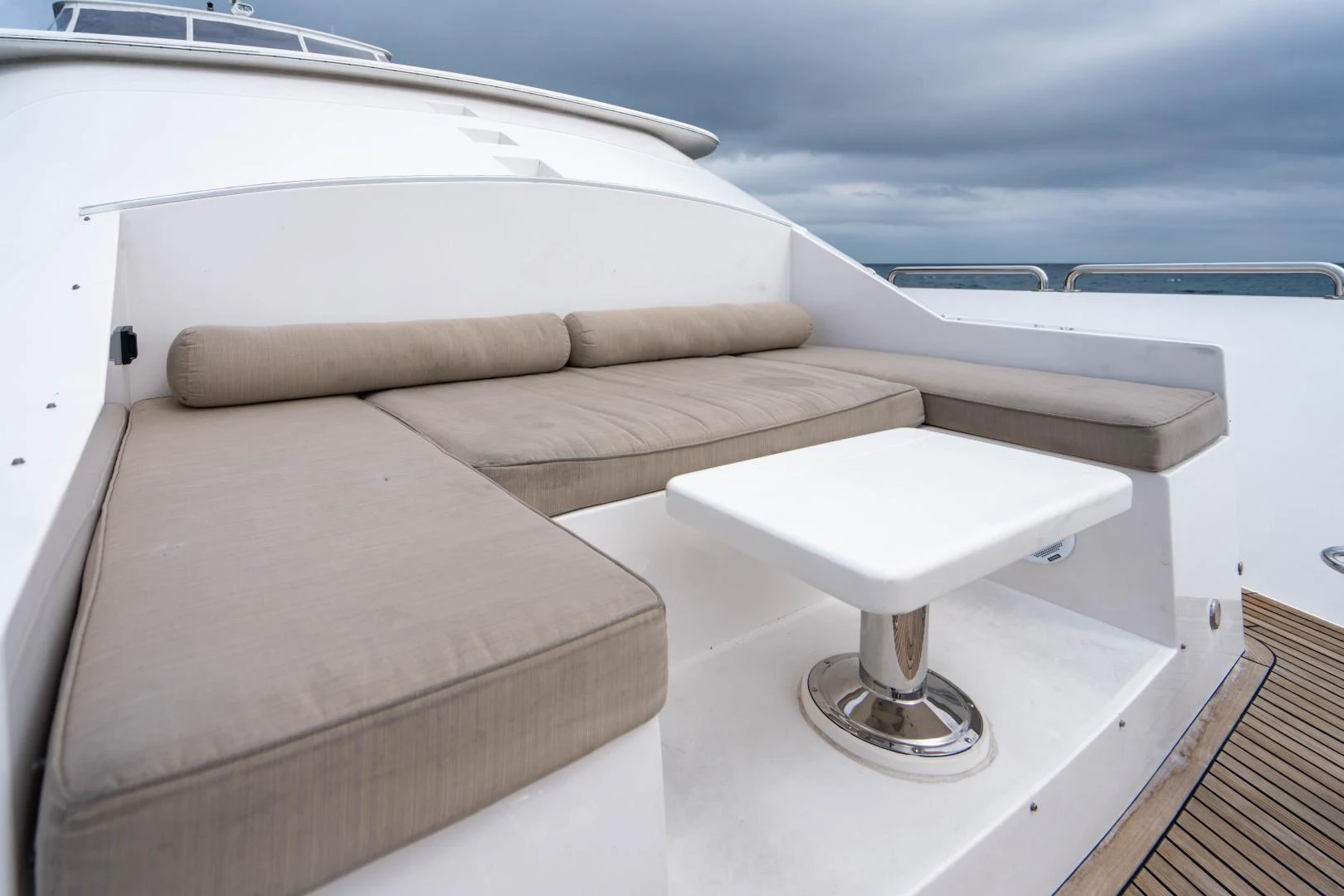 a white couch on a boat aboard RENAISSANCE Yacht for Sale