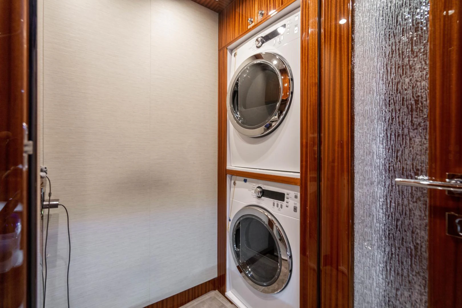 a washer and dryer in a room aboard RENAISSANCE Yacht for Sale