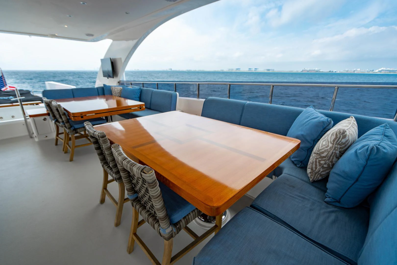 a table and chairs on a boat aboard RENAISSANCE Yacht for Sale
