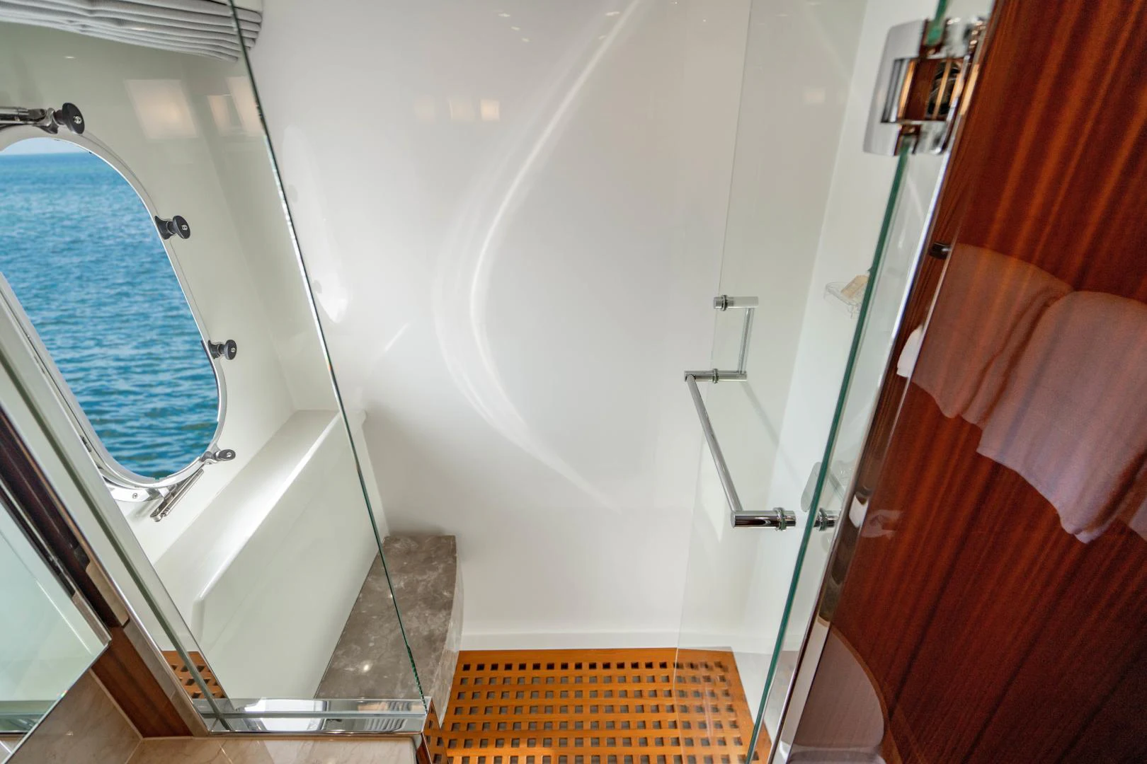 a bathroom with a glass shower aboard RENAISSANCE Yacht for Sale