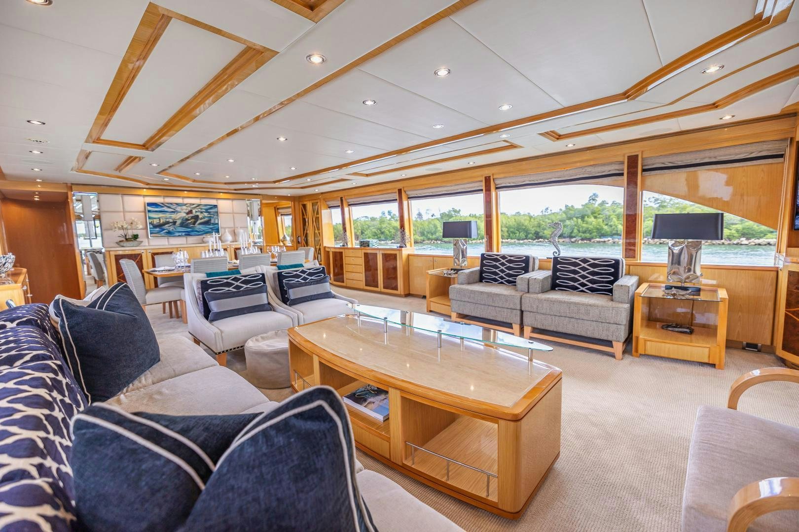 a living room with a large window aboard GRATITUDE Yacht for Sale