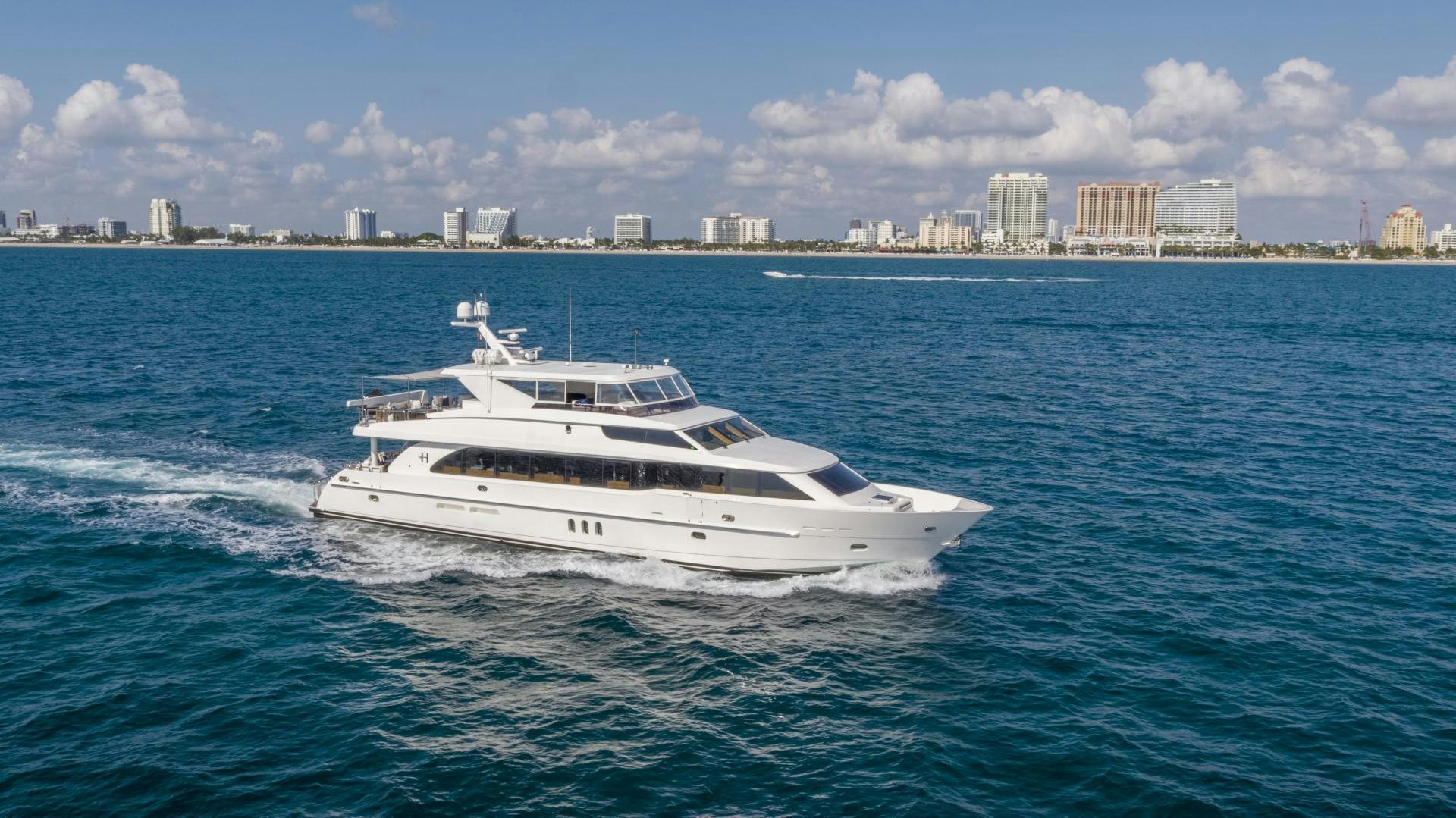 a white boat in the water aboard GRATITUDE Yacht for Sale