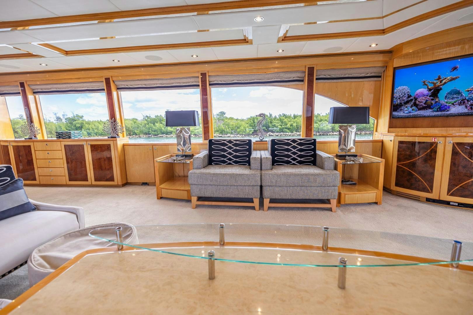 a living room with a pool table aboard GRATITUDE Yacht for Sale