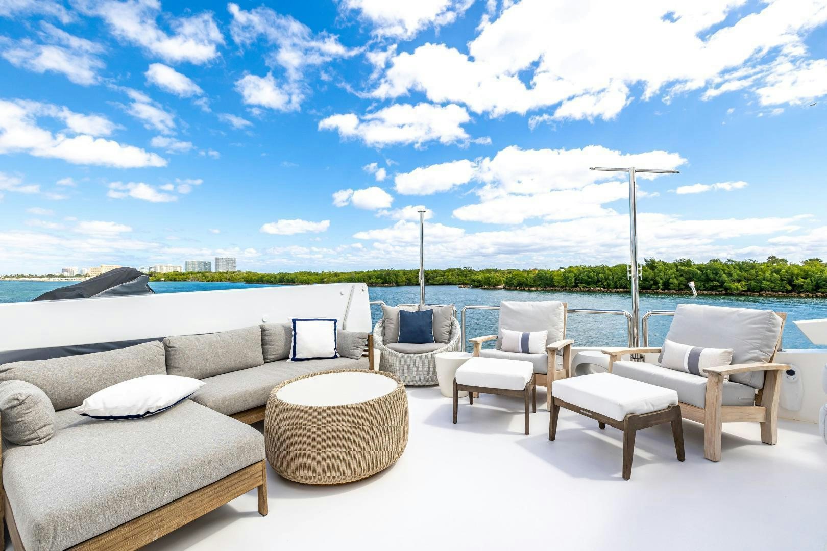 a group of chairs on a patio aboard GRATITUDE Yacht for Sale