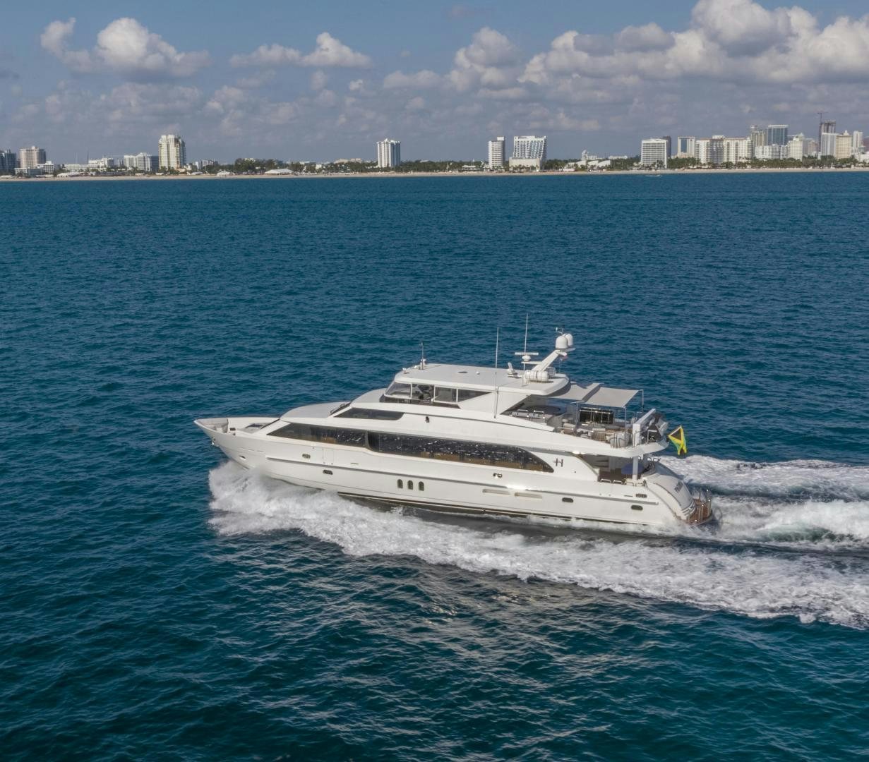 a white boat in the water aboard GRATITUDE Yacht for Sale