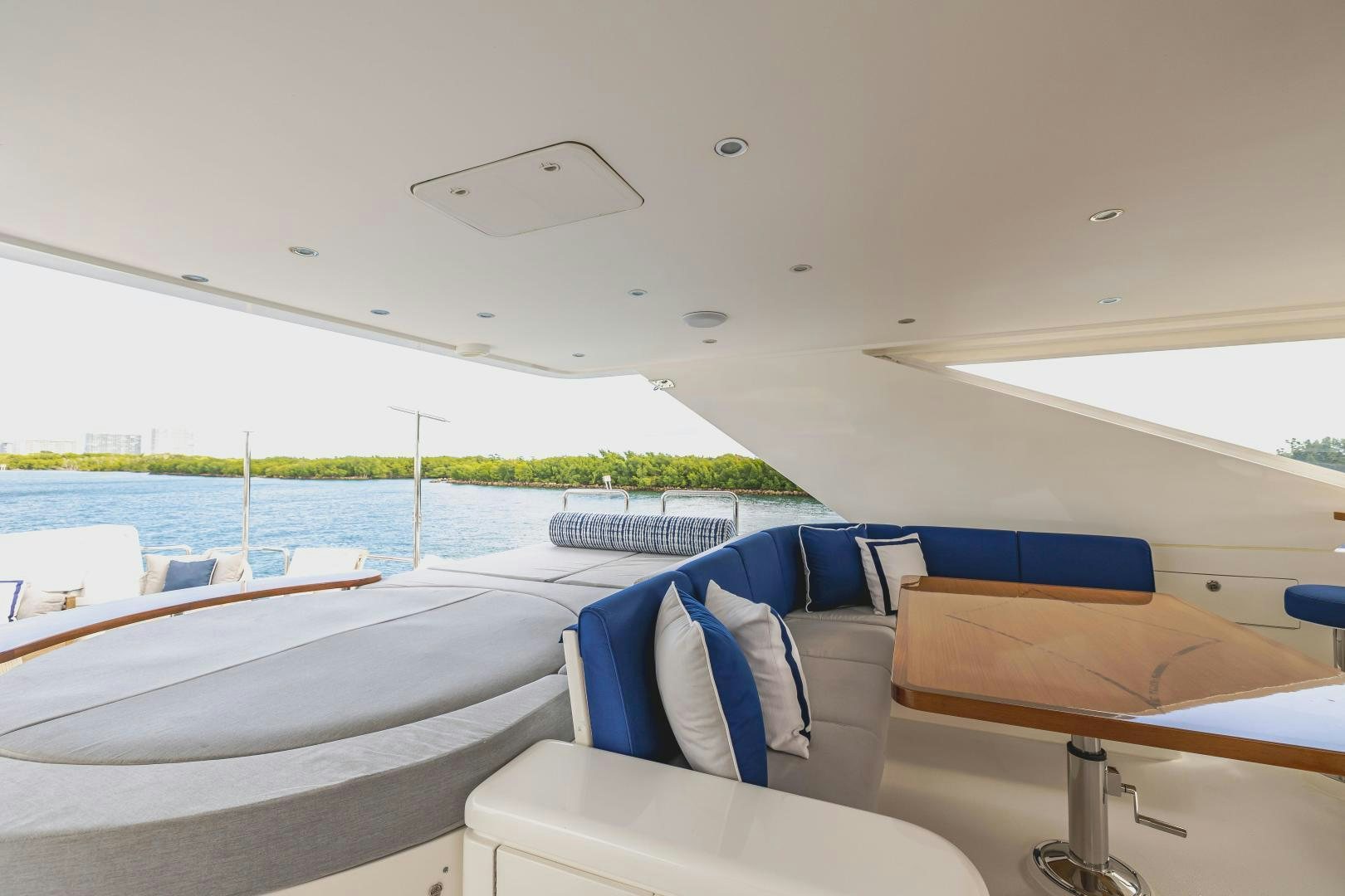 a room with a bed and a pool aboard GRATITUDE Yacht for Sale