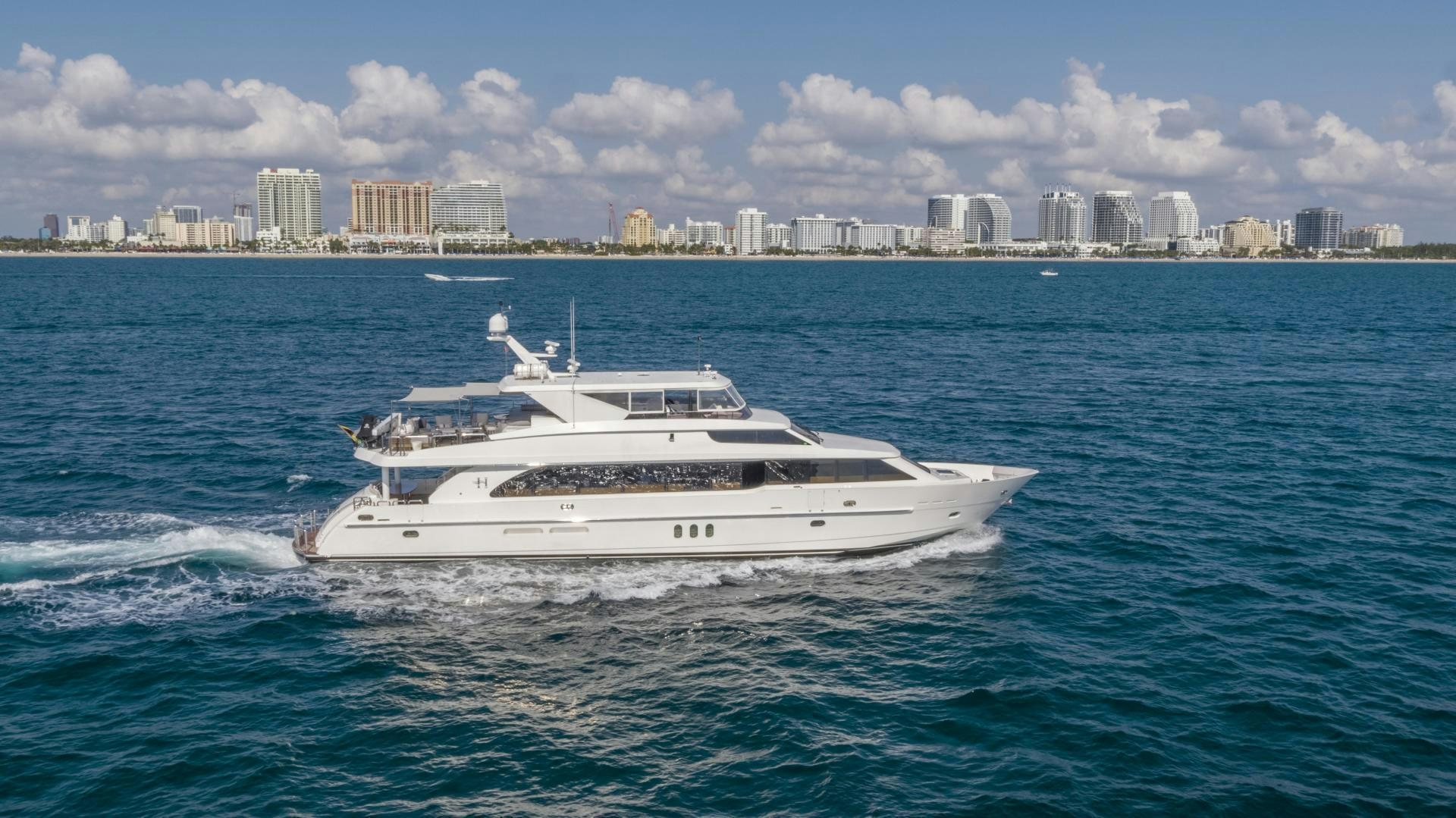 a white yacht in the water aboard GRATITUDE Yacht for Sale