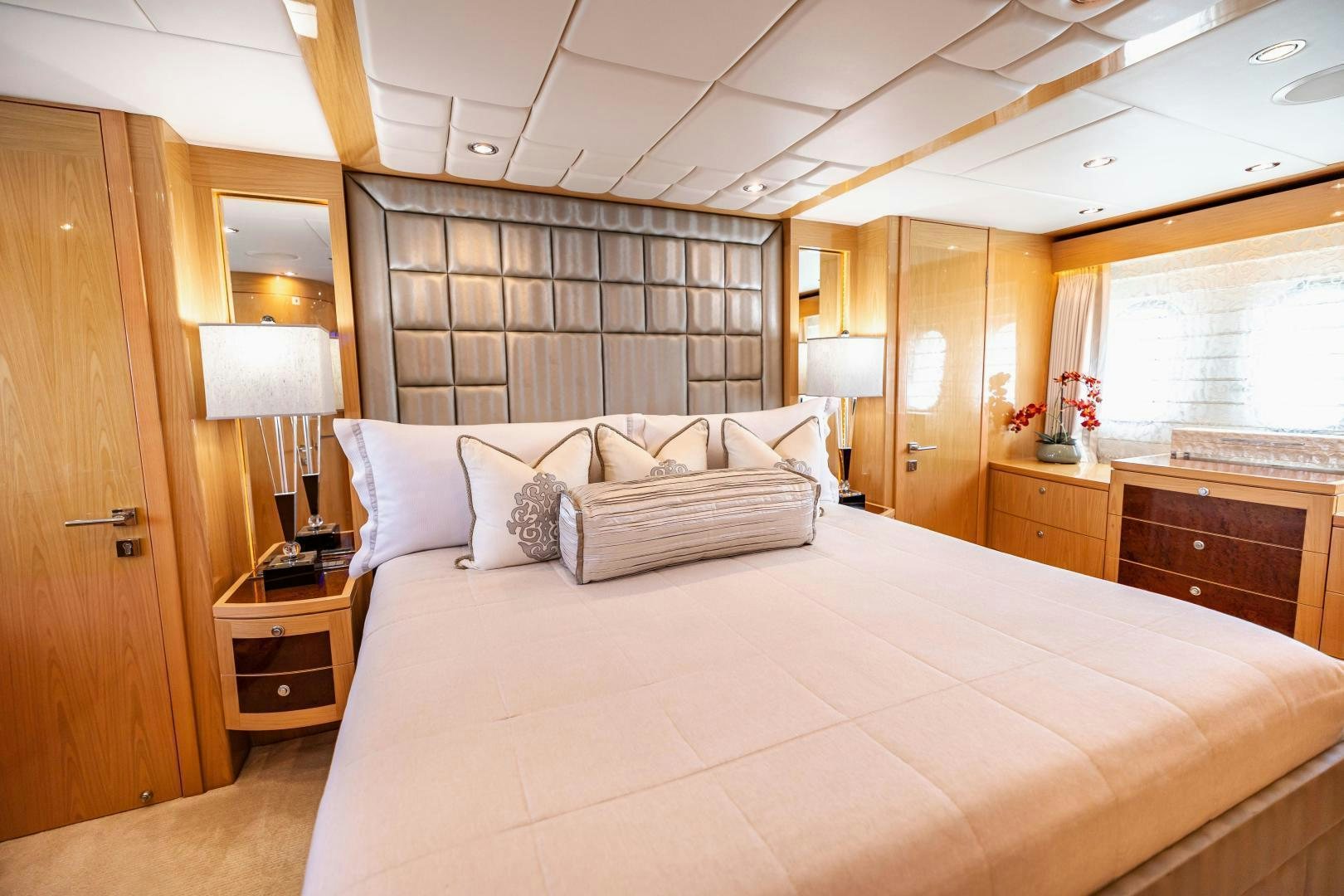 a large bed in a hotel room aboard GRATITUDE Yacht for Sale