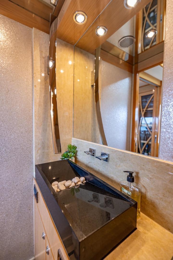 a bathroom with a marble counter aboard GRATITUDE Yacht for Sale