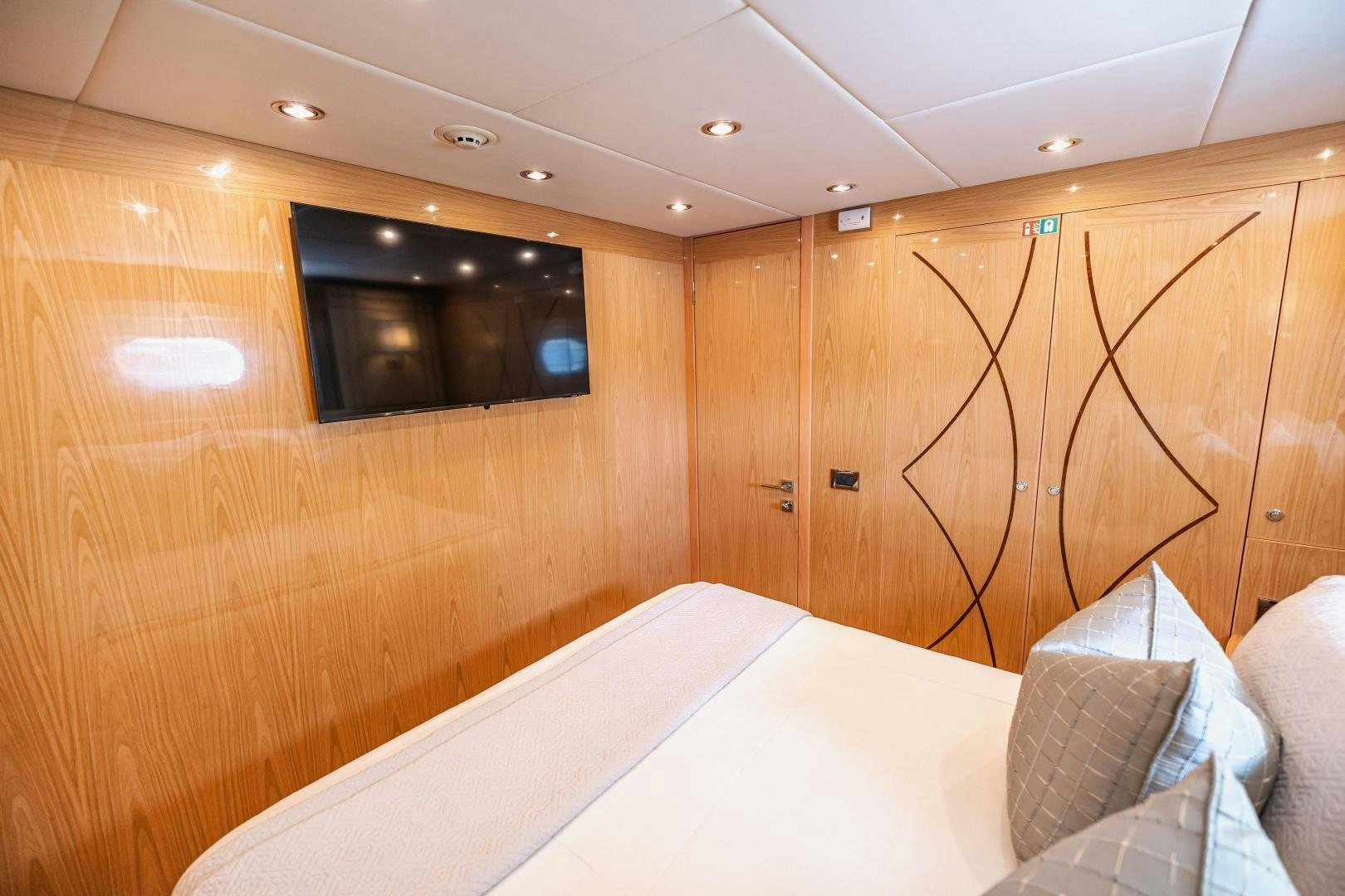 a bed in a room aboard GRATITUDE Yacht for Sale