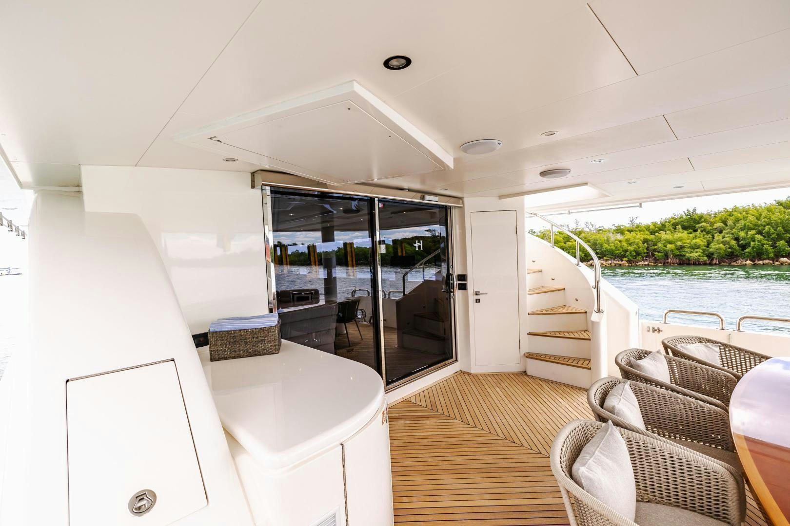 a room with a table and chairs aboard GRATITUDE Yacht for Sale