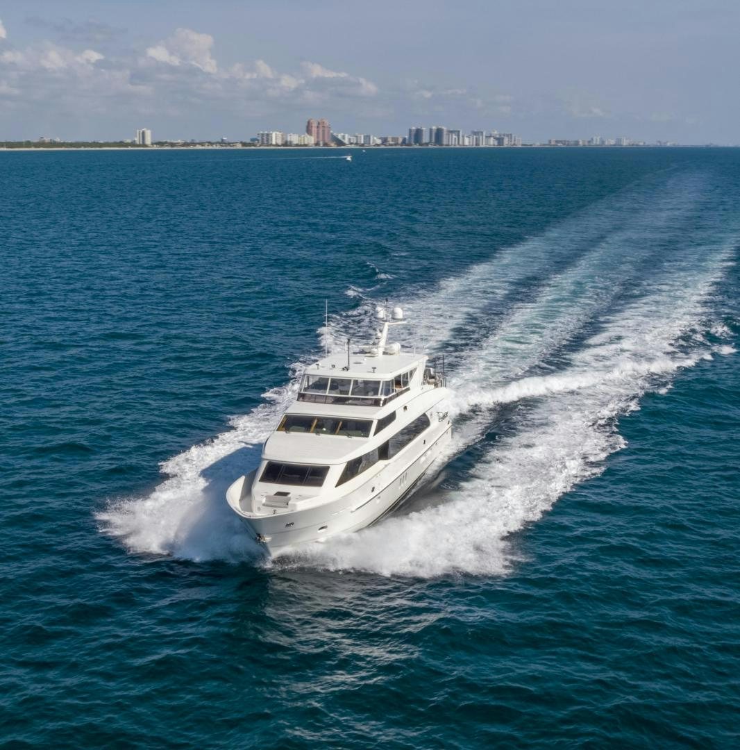 a white boat on the water aboard GRATITUDE Yacht for Sale