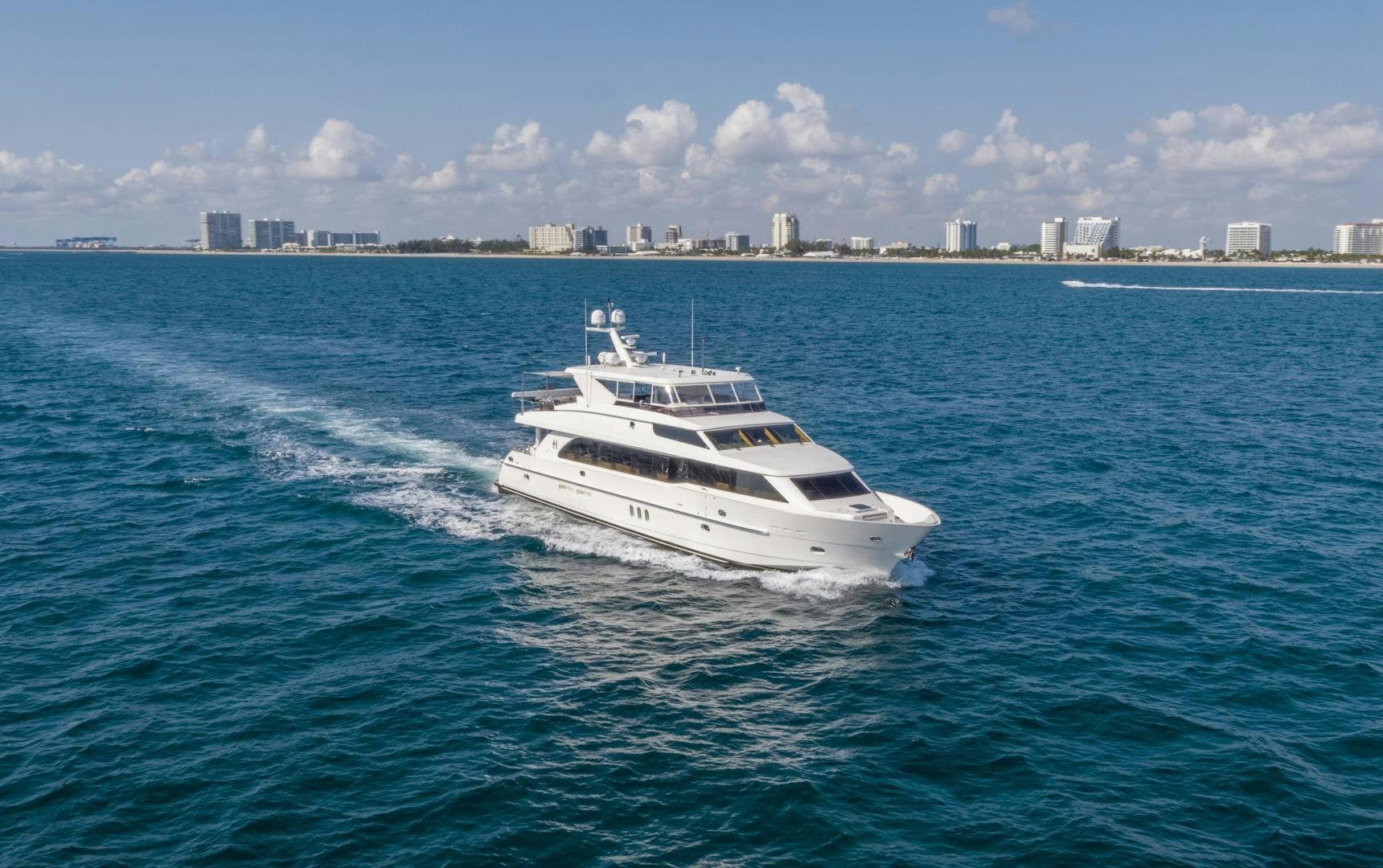 a white yacht on the water aboard GRATITUDE Yacht for Sale