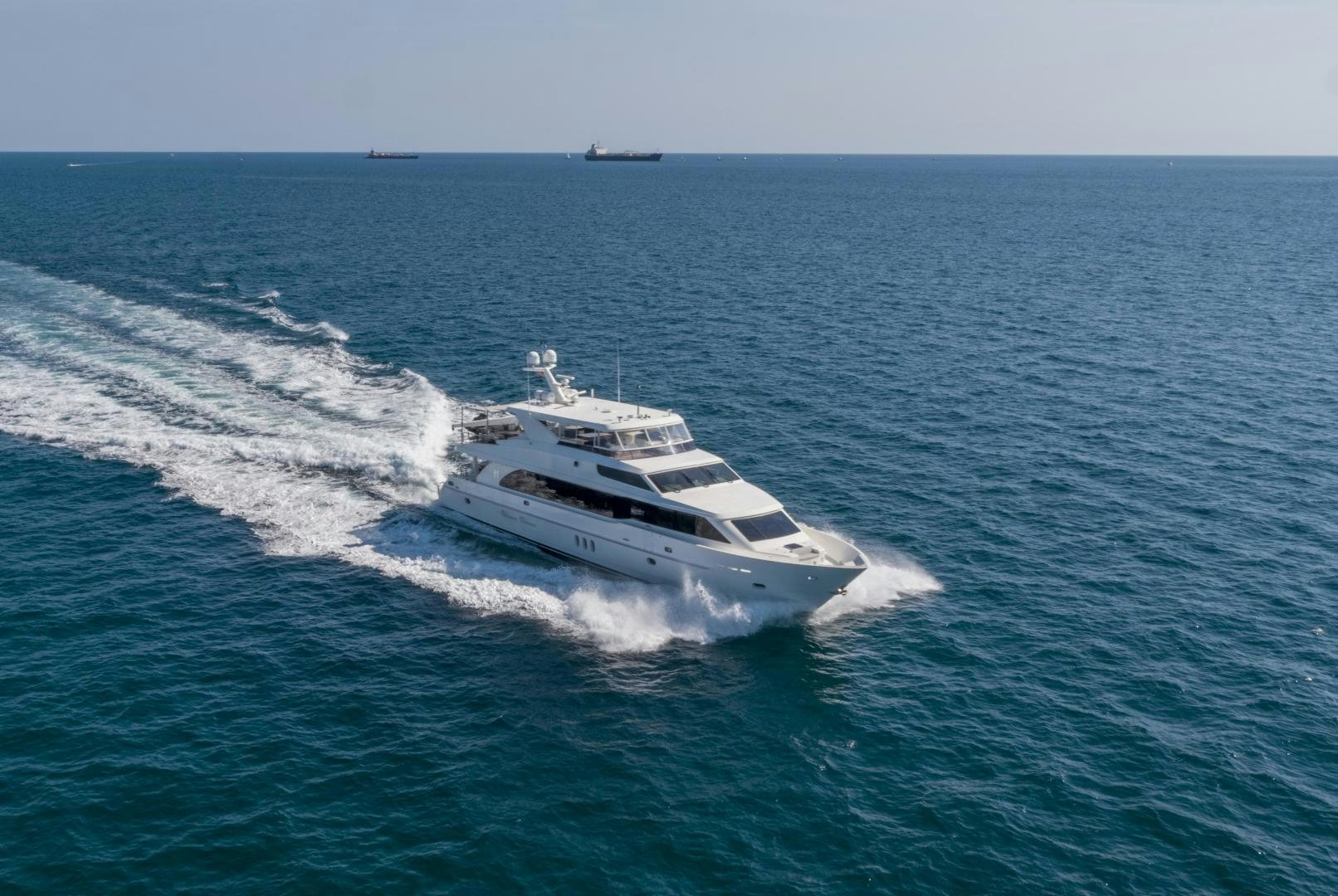 a white boat on the water aboard GRATITUDE Yacht for Sale