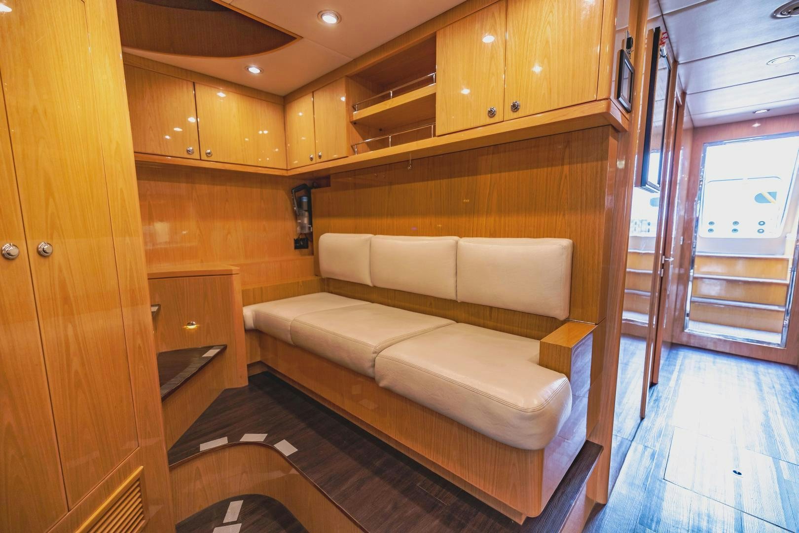 a living room with a couch aboard GRATITUDE Yacht for Sale