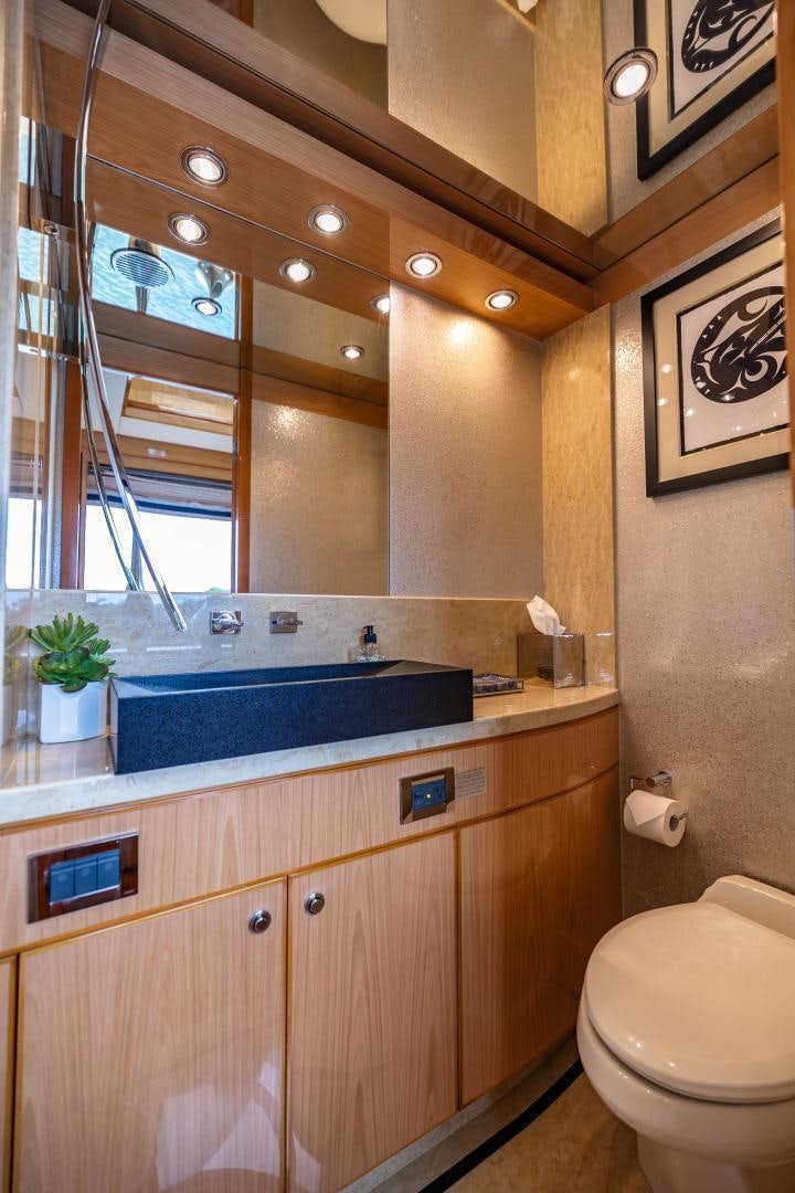 a bathroom with a large mirror aboard GRATITUDE Yacht for Sale