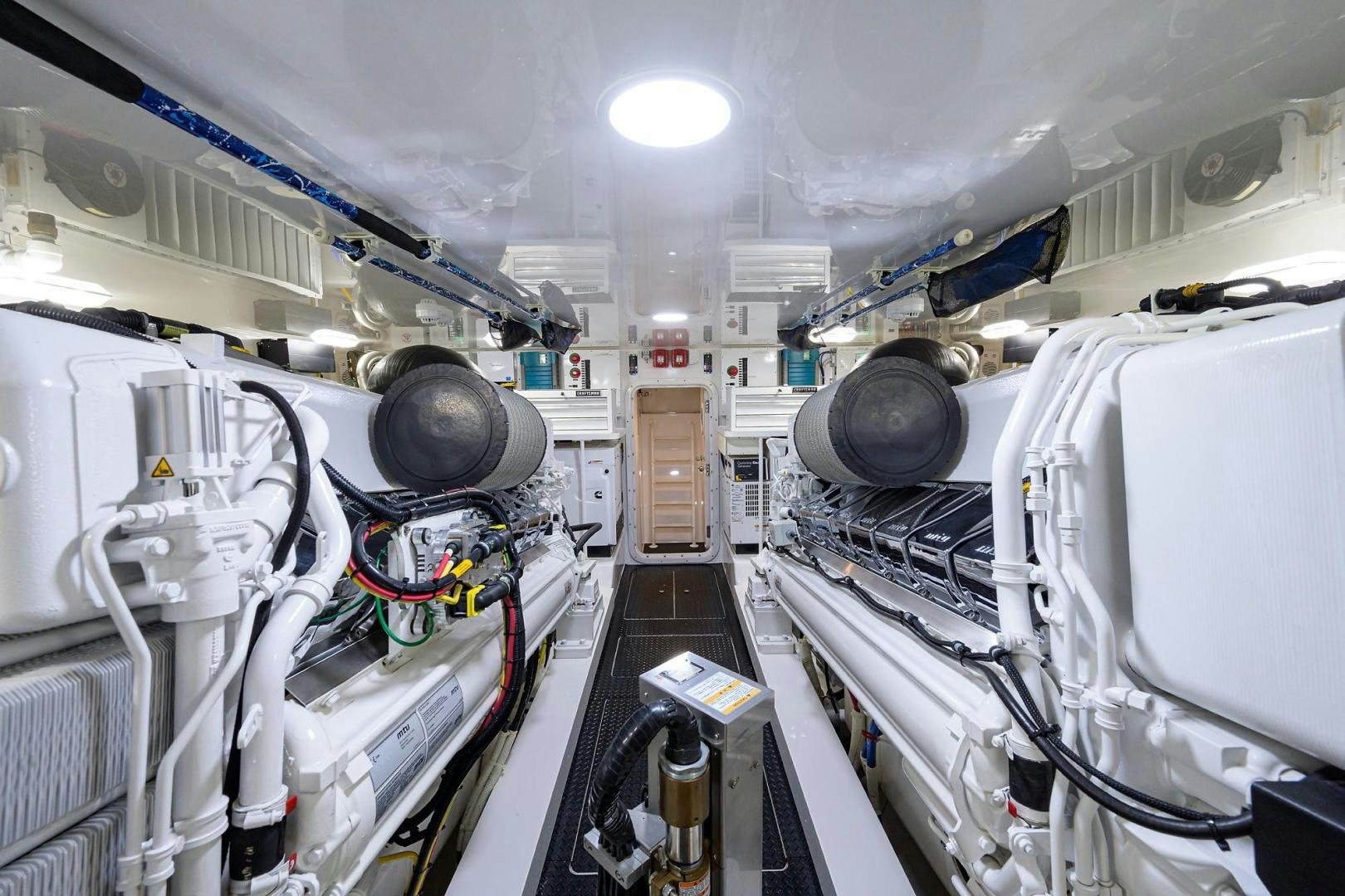 a room with machines and pipes aboard QUICK RAISE Yacht for Sale