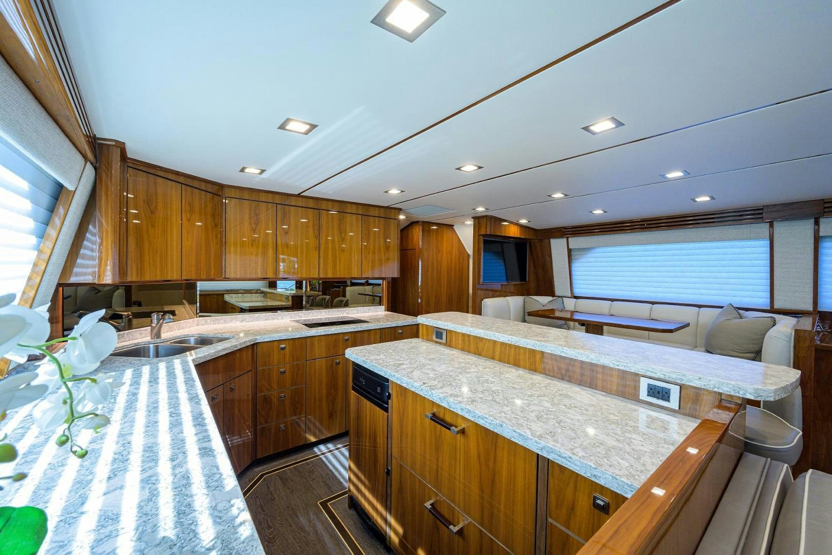 a large kitchen with wooden cabinets aboard QUICK RAISE Yacht for Sale