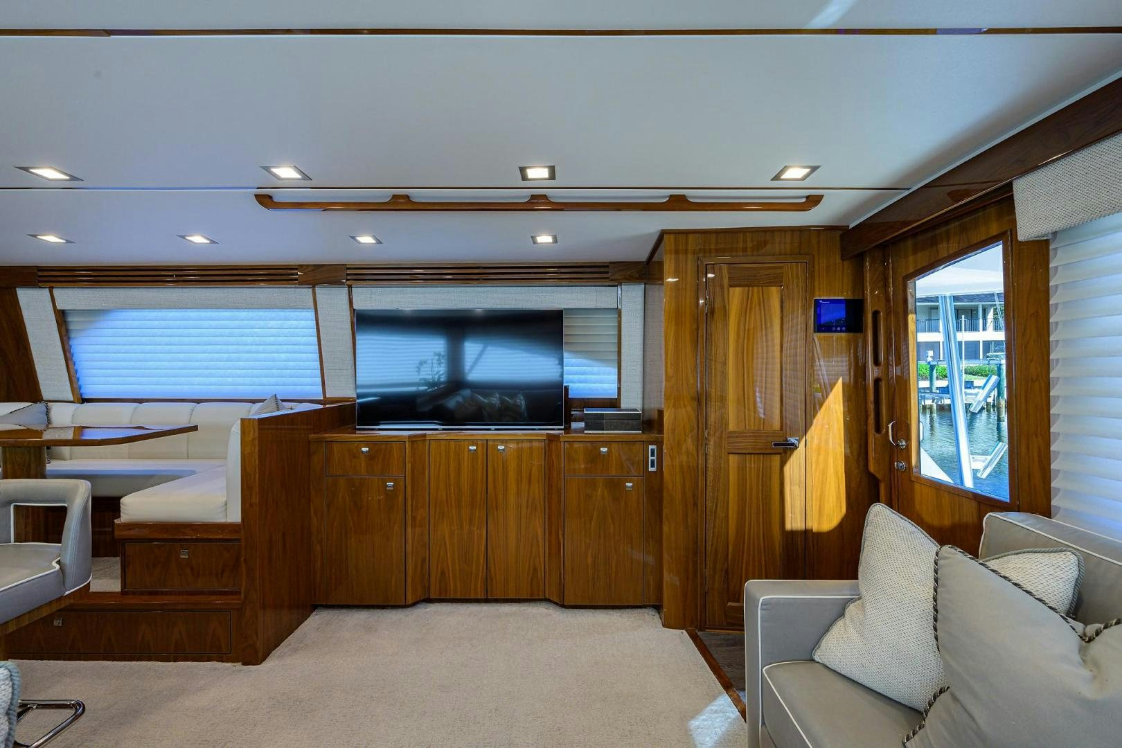 a room with a couch and a television aboard QUICK RAISE Yacht for Sale