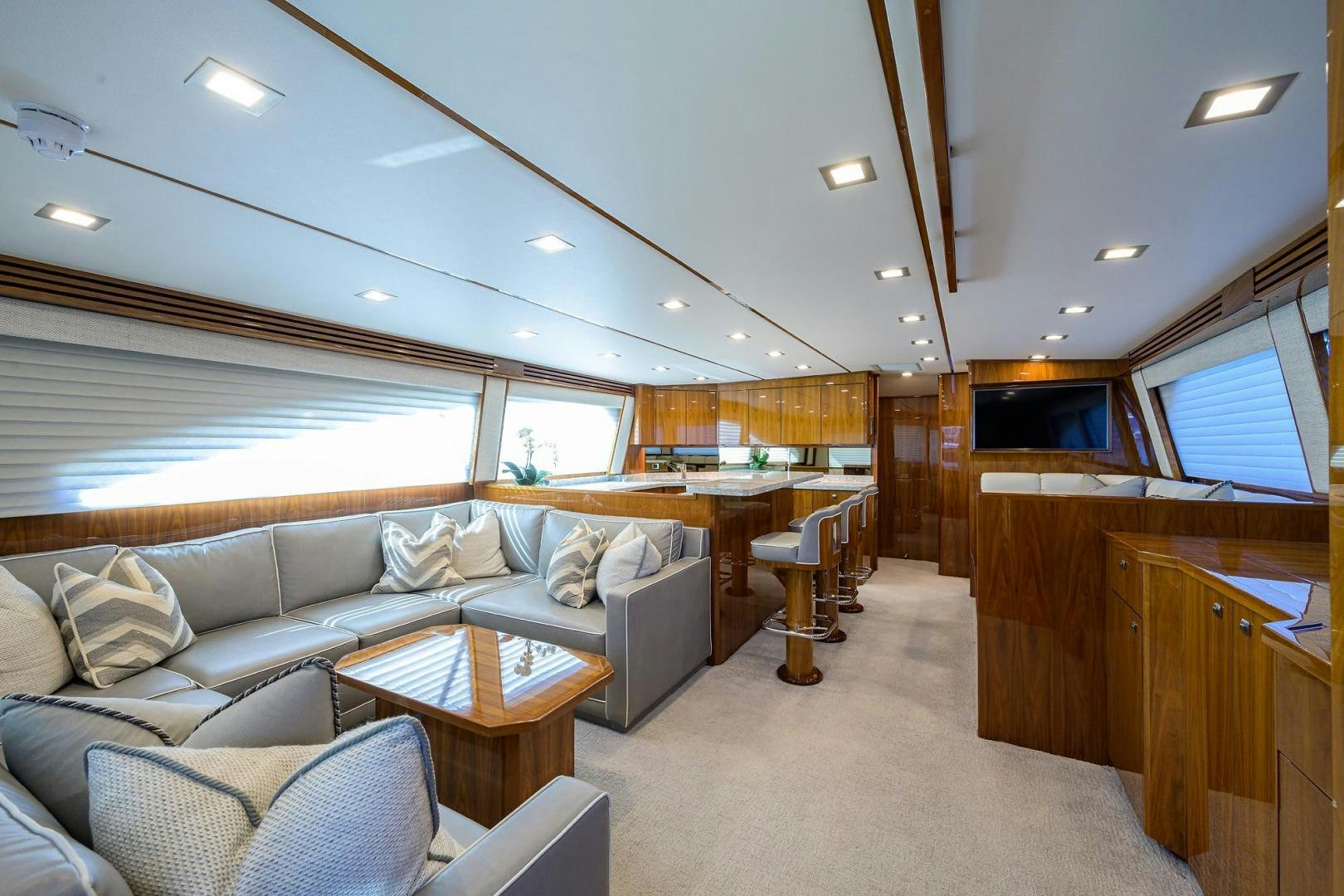 a living room with a couch and a table aboard QUICK RAISE Yacht for Sale