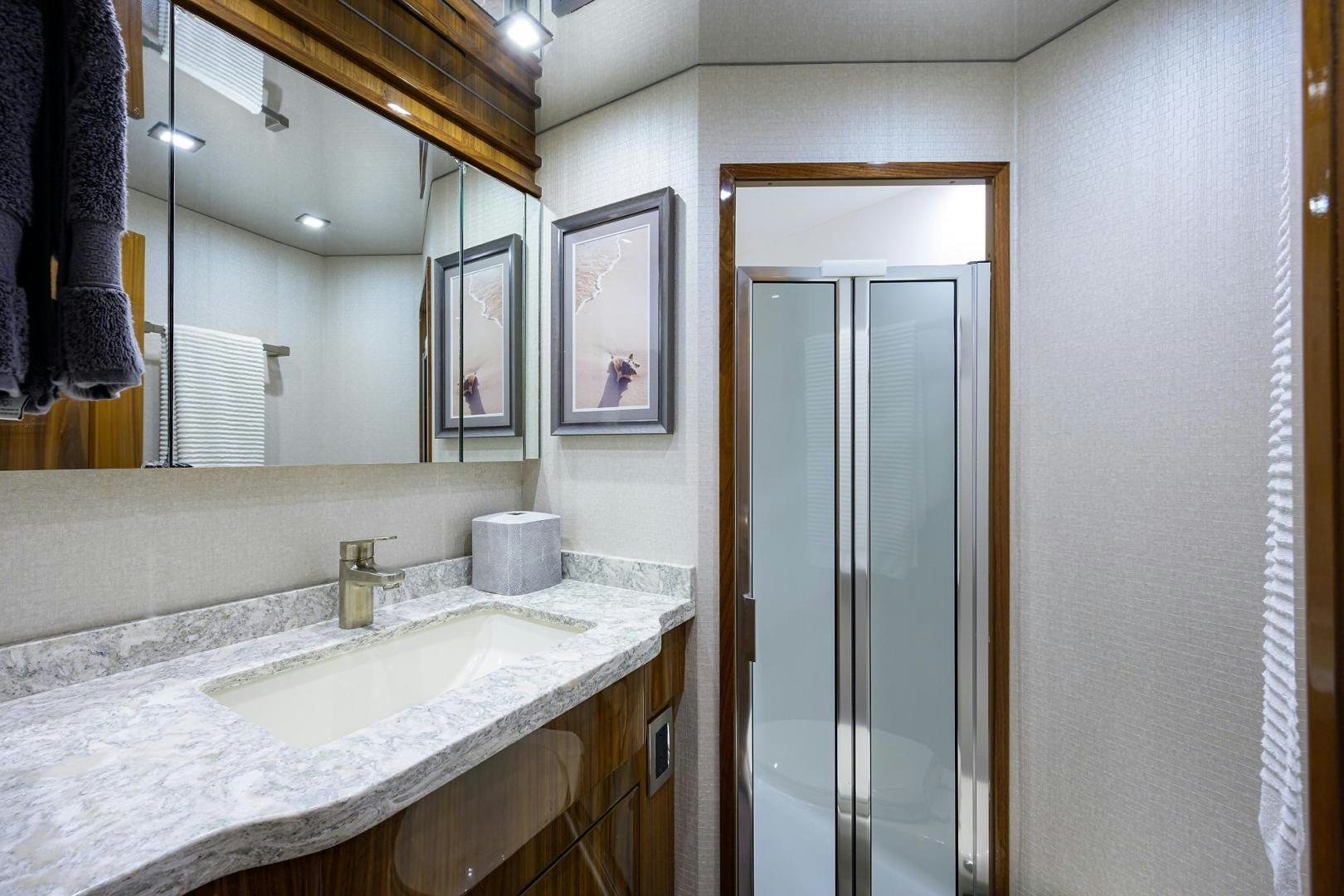 a bathroom with a large mirror aboard QUICK RAISE Yacht for Sale
