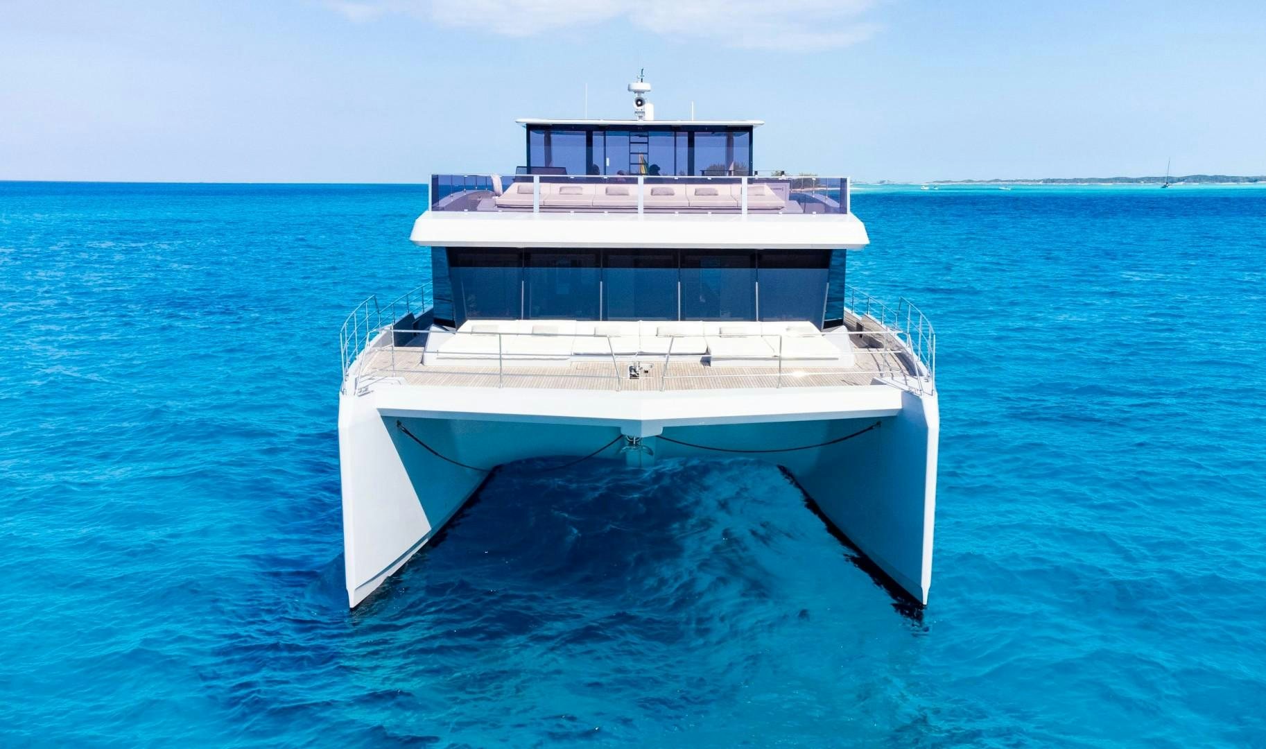 a white boat in the water aboard EMMILIZA Yacht for Sale