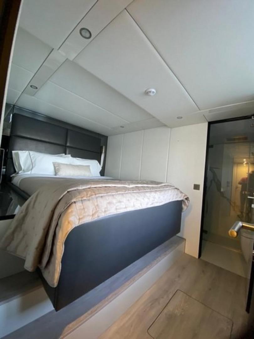 a bed in a room aboard EMMILIZA Yacht for Sale