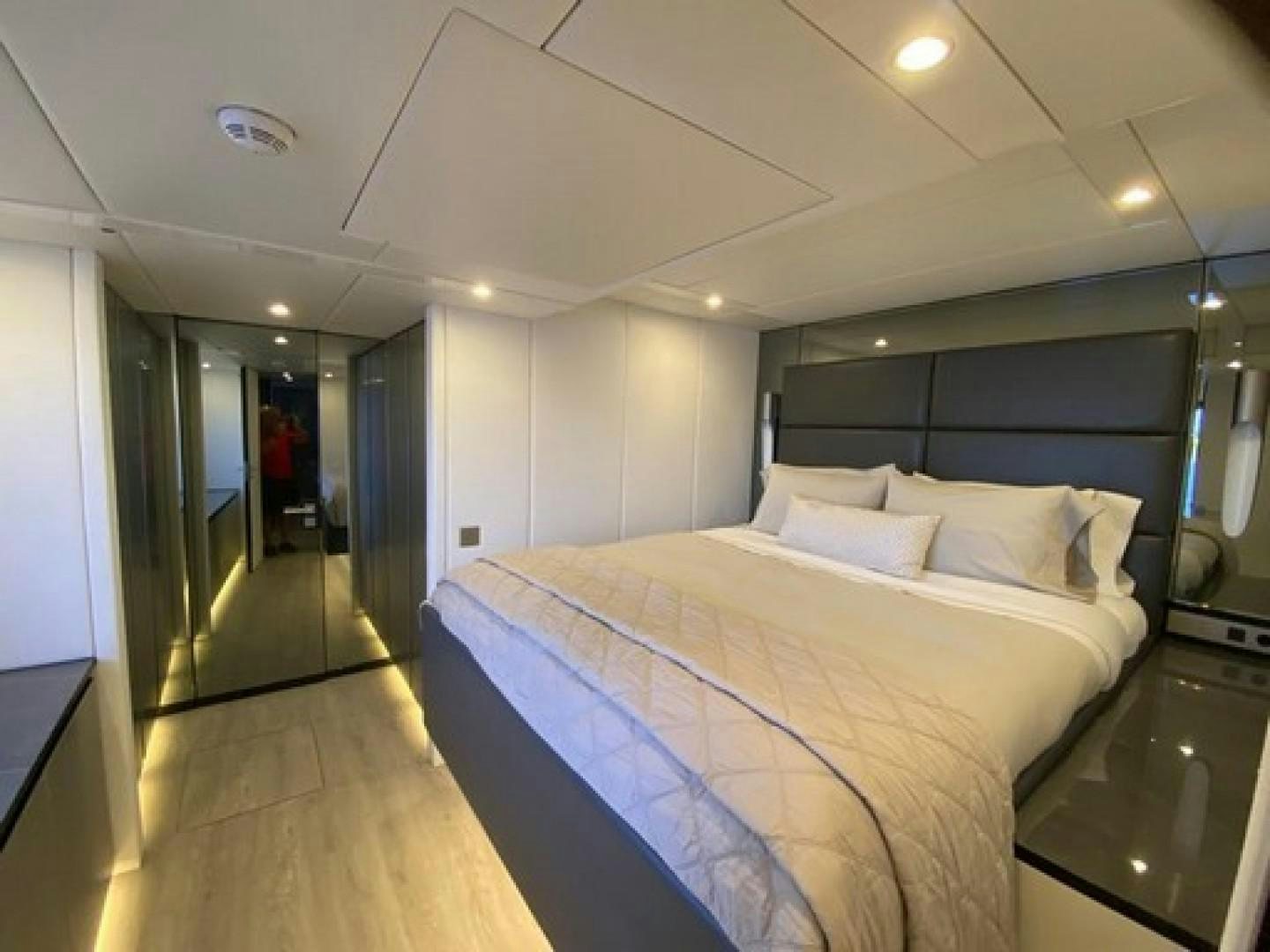 a bedroom with a bed aboard EMMILIZA Yacht for Sale