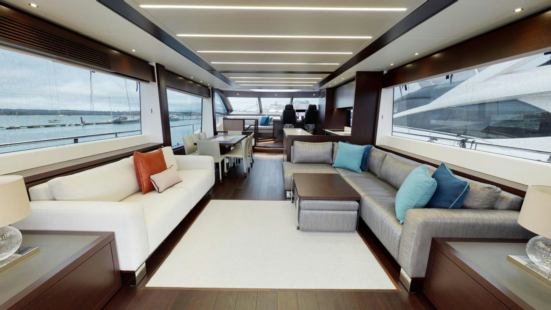 a living room with a large window aboard MOONLIGHT Yacht for Sale