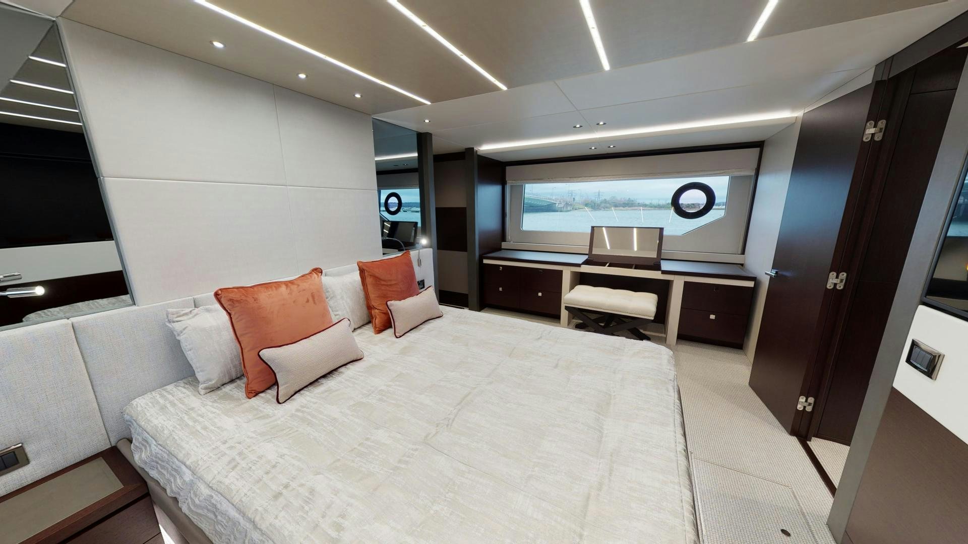 a room with a bed and a desk aboard MOONLIGHT Yacht for Sale