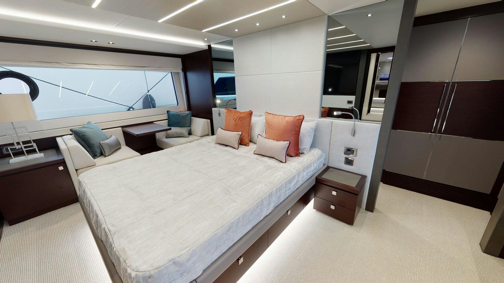 a room with a bed and a desk aboard MOONLIGHT Yacht for Sale