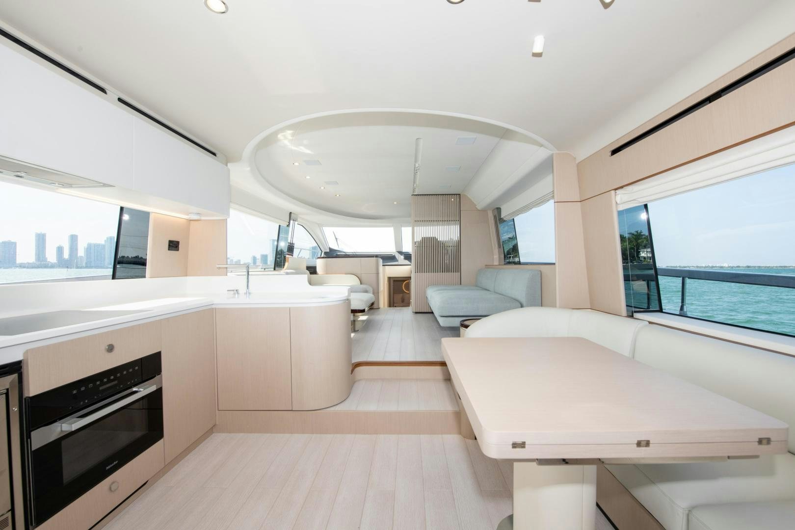 a modern kitchen with a large open space aboard CRIMSON Yacht for Sale