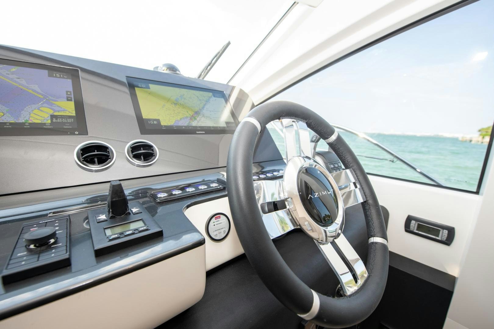 the inside of a car aboard CRIMSON Yacht for Sale