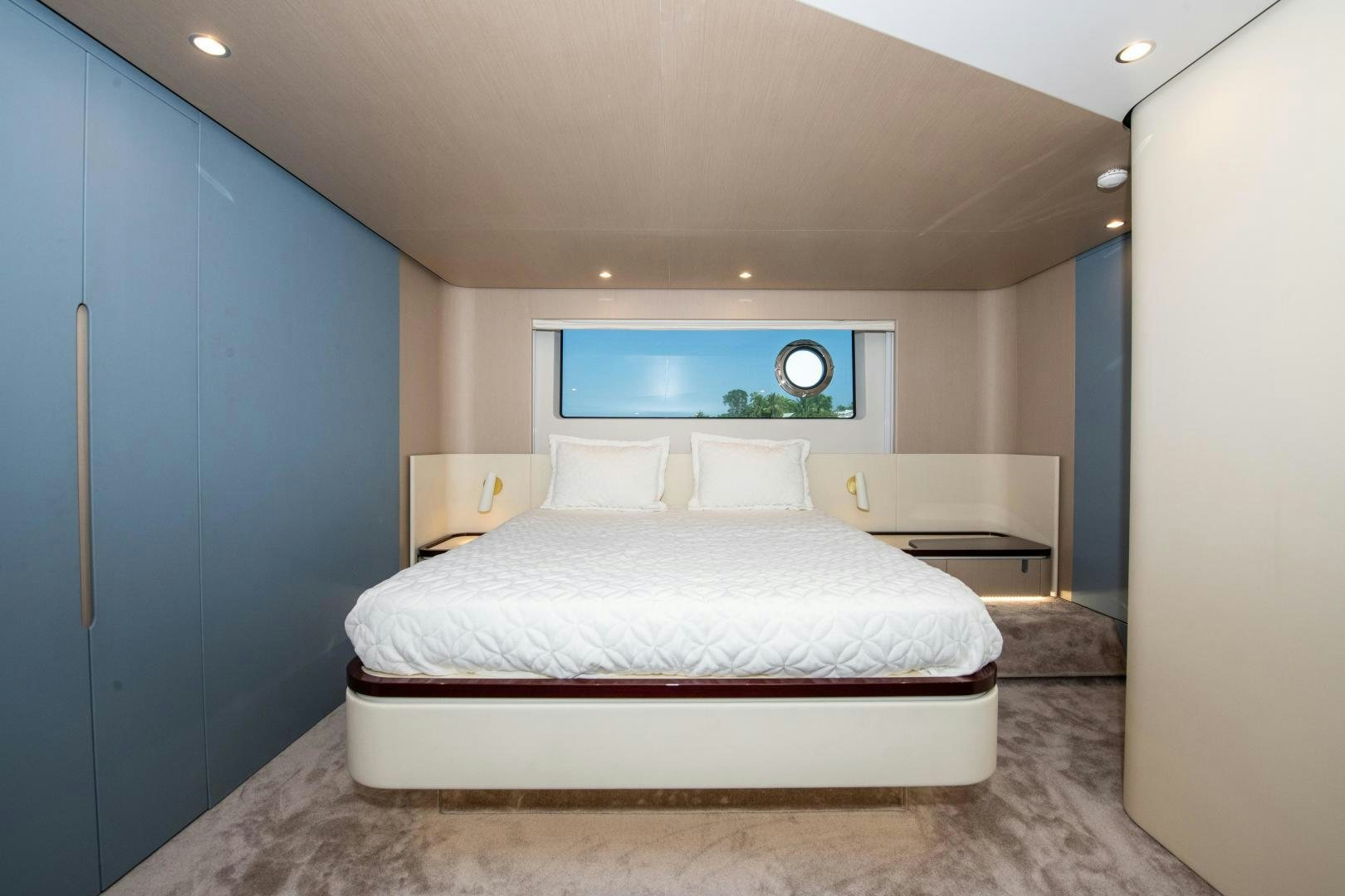 a bed in a room aboard CRIMSON Yacht for Sale