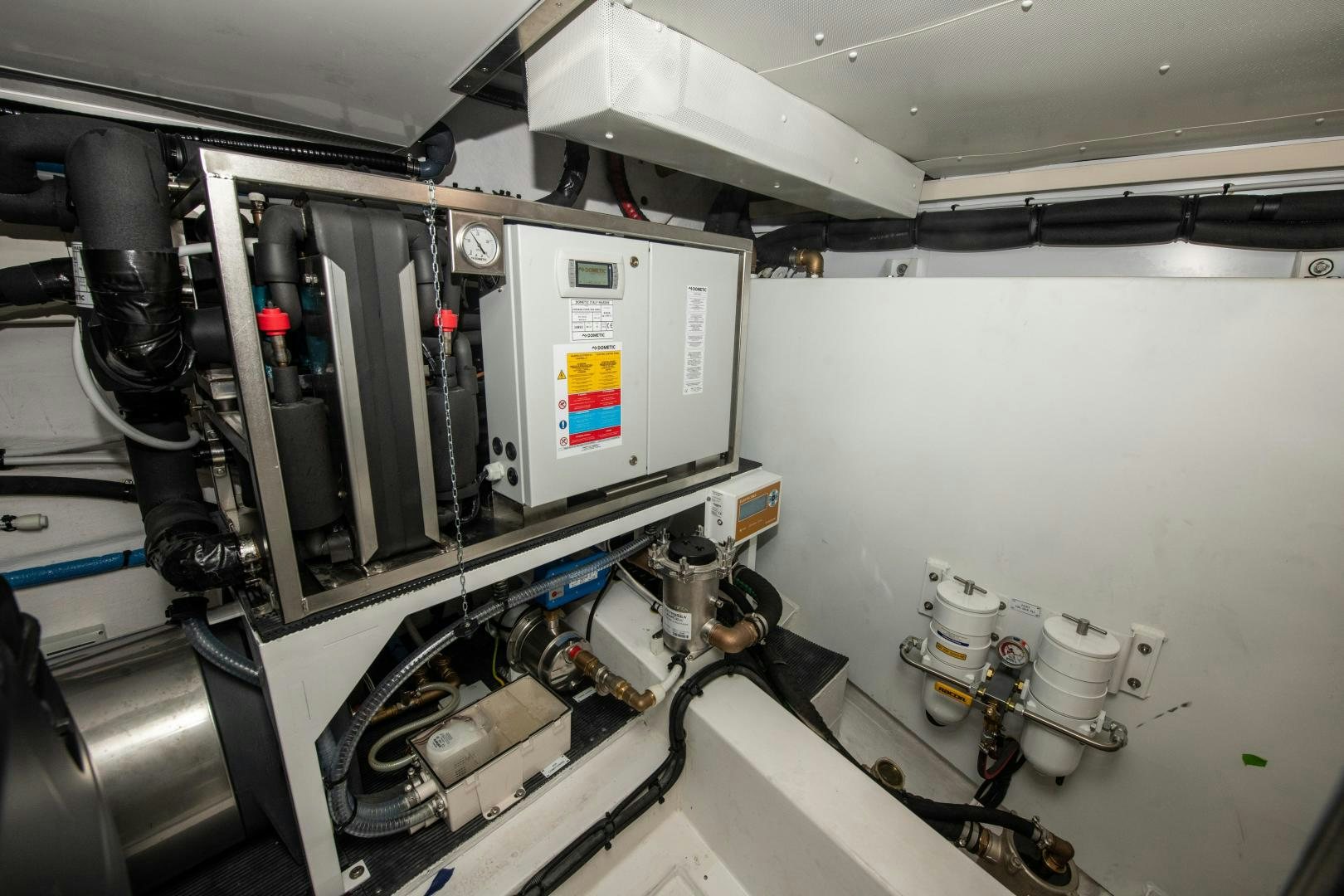 a machine with wires aboard CRIMSON Yacht for Sale