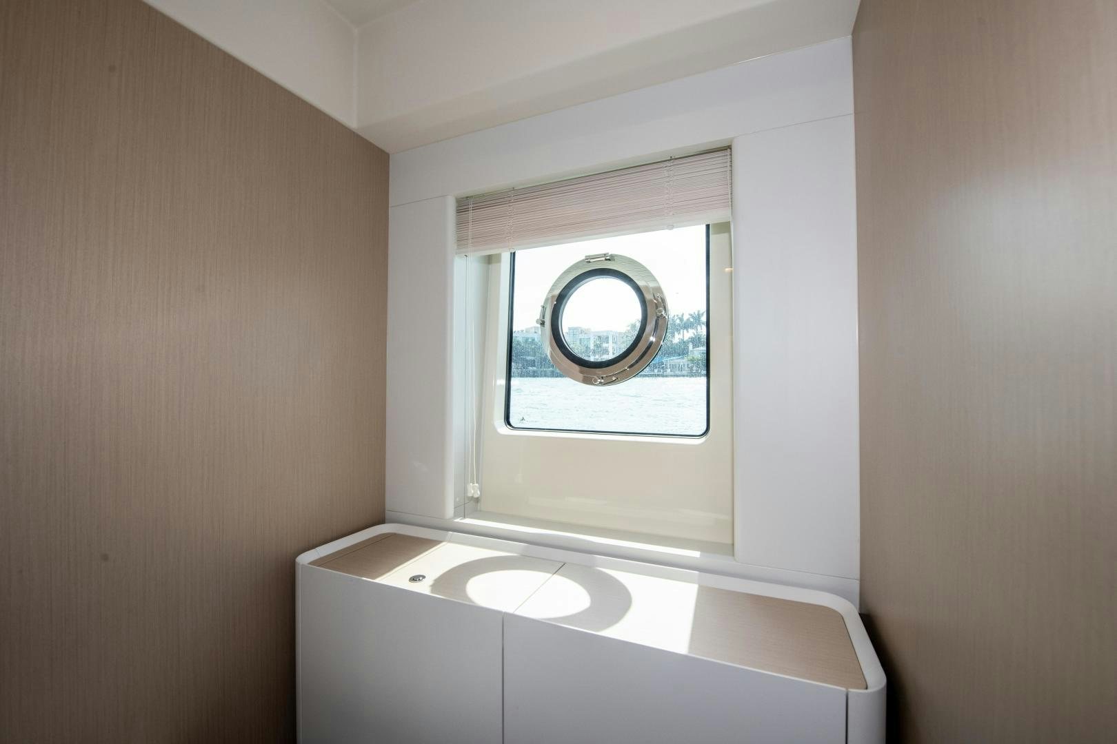 a window in a room aboard CRIMSON Yacht for Sale