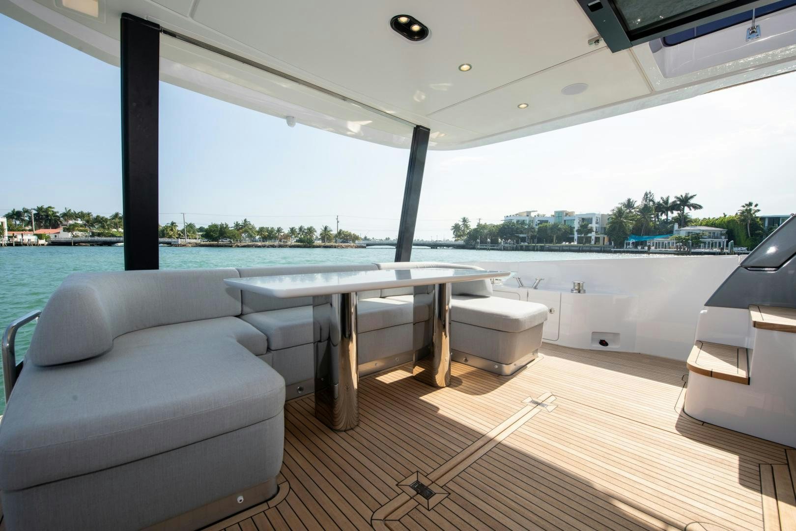 a room with a table and chairs aboard CRIMSON Yacht for Sale