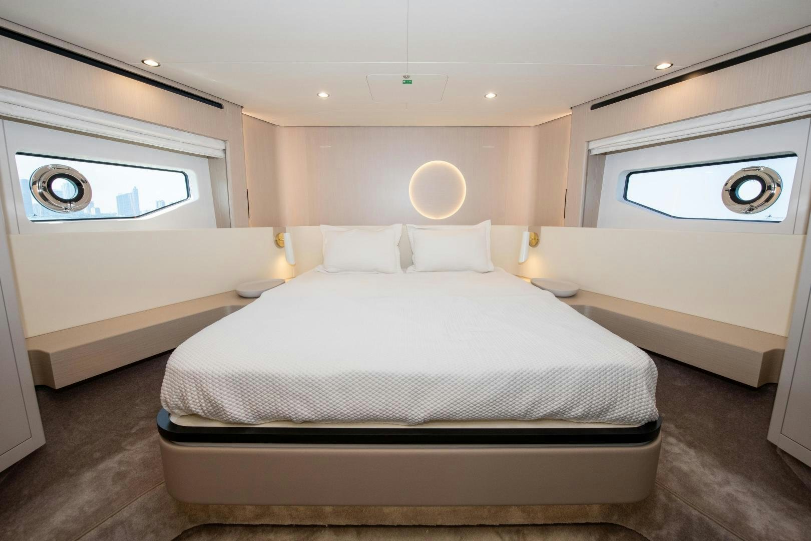 a bed in a room aboard CRIMSON Yacht for Sale
