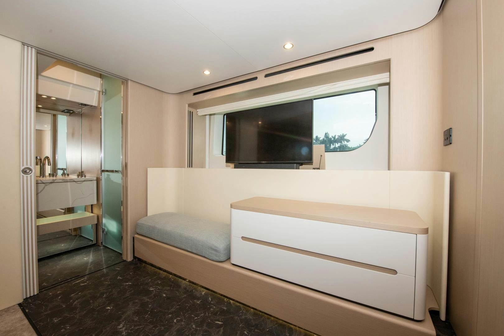 a room with a bed and a tv aboard CRIMSON Yacht for Sale