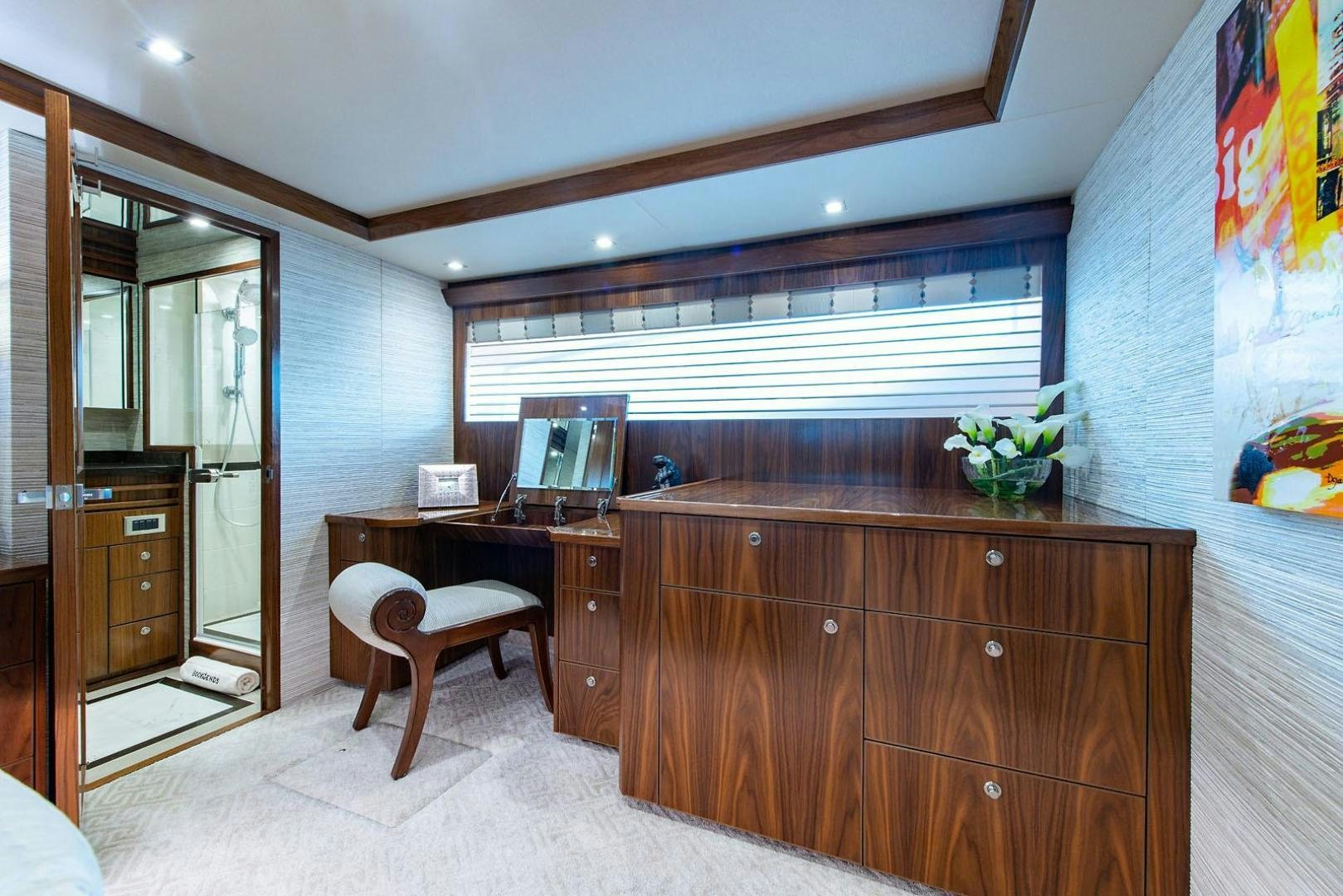 a room with a desk and a chair aboard OBSESSION Yacht for Sale