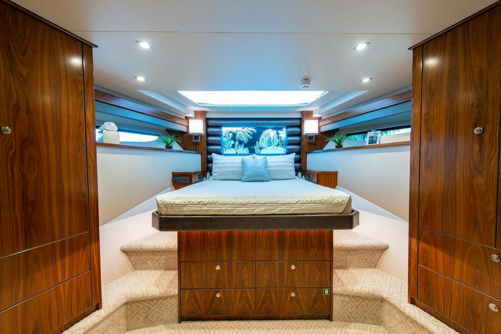 a bed in a room aboard OBSESSION Yacht for Sale